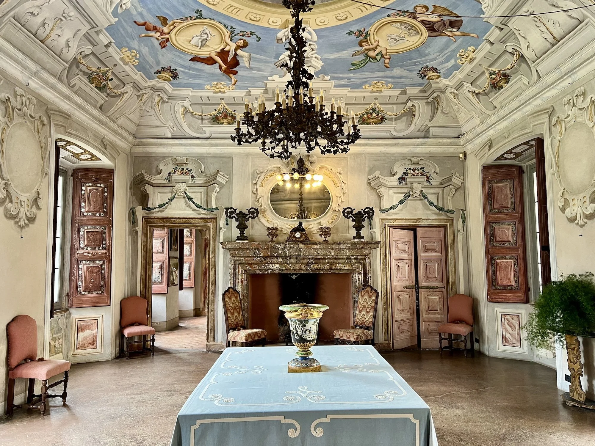 Interior view of Italian villa with opulent architectural details and frescoes