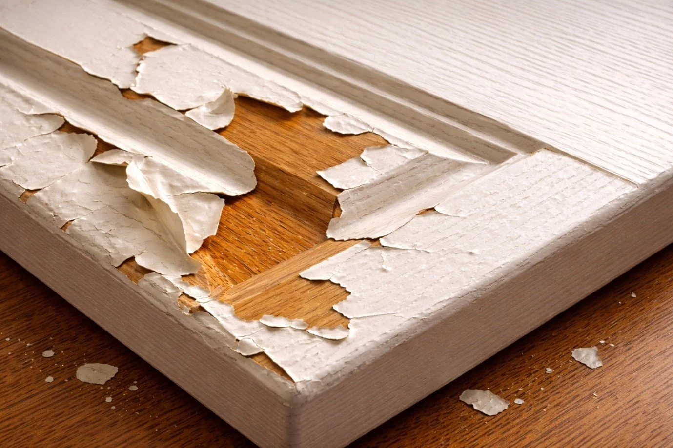 Why is Your Cabinet Paint Peeling or Not Sticking? The Risks of DIY vs. Professional Refinishing