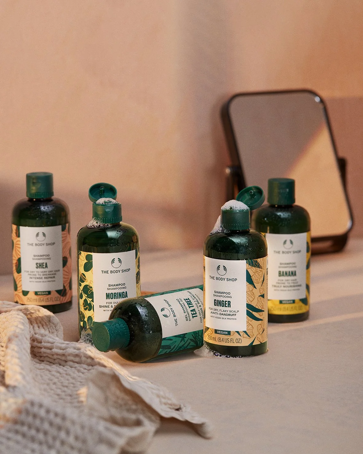 The Body Shop hair campaign product imagery.