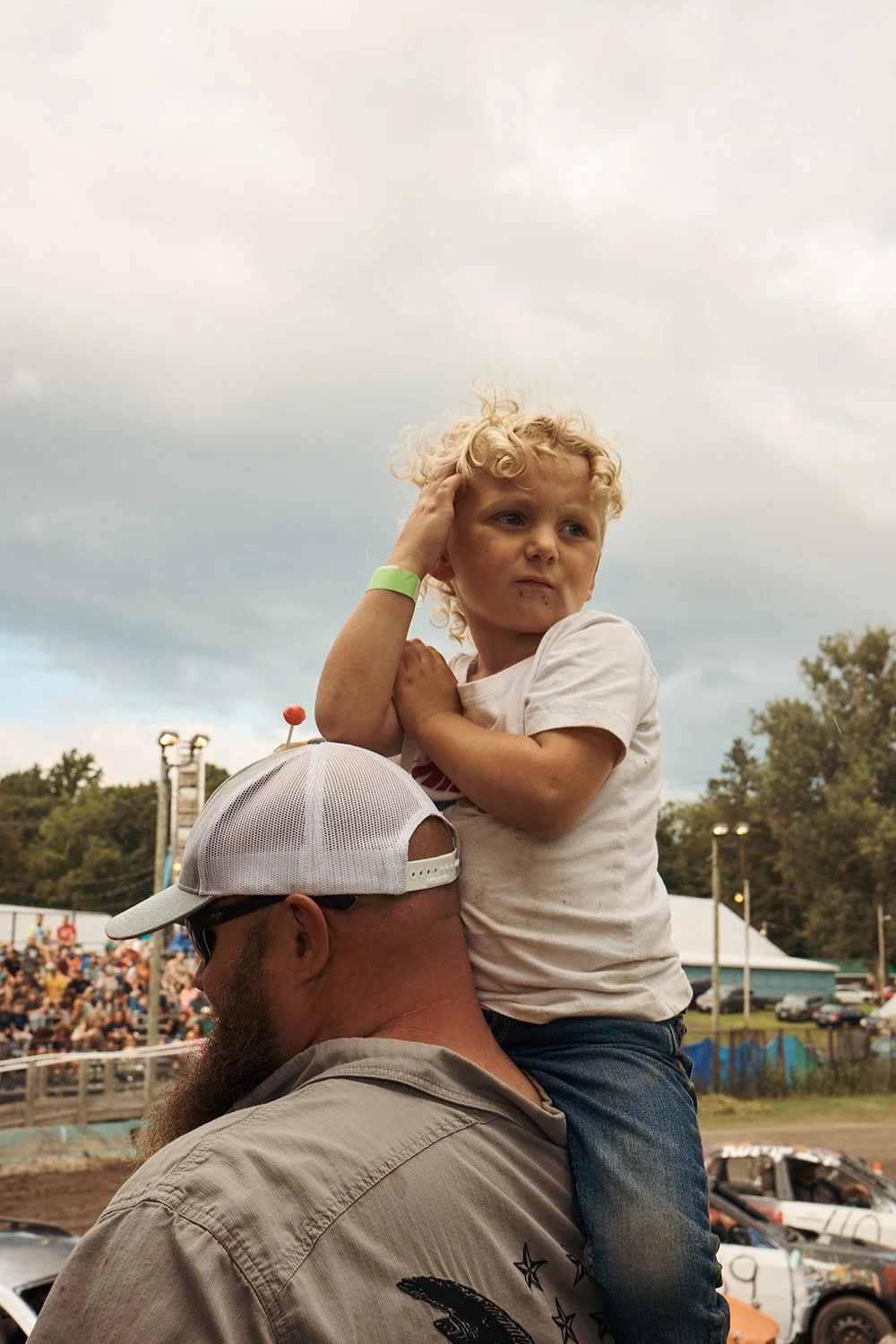 TBurgFair_Blonde_Kid_OnDadsShoulders.jpg