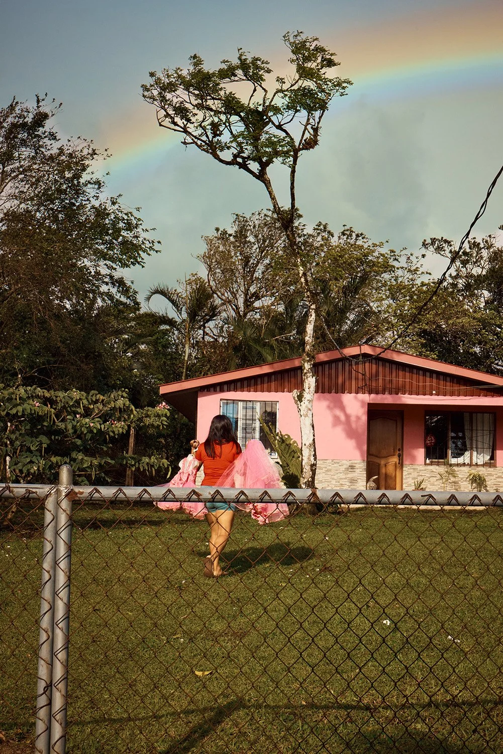 CostaRica_Girl_Yard_Pinkdresses_Rainbow.jpg