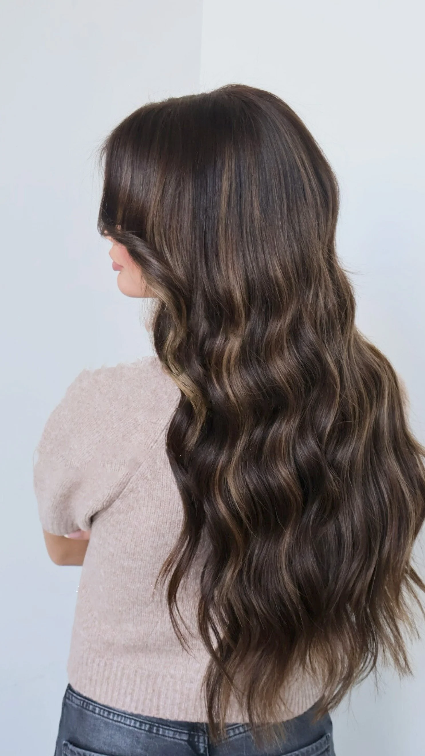 Woman with long brown hair extensions