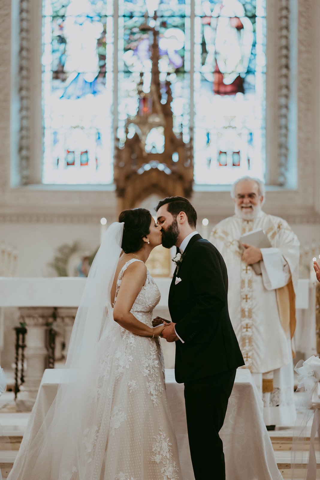 June-wedding-cathedral-of-saint-catherine-of-alexandria-ceremony-first-kiss.jpg