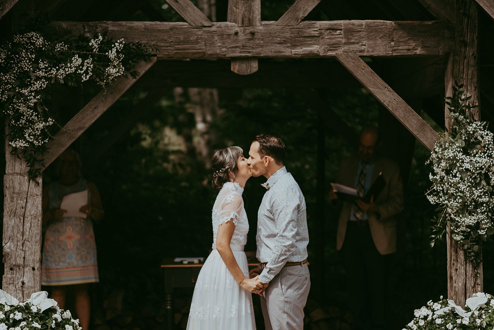toronto-summer-july-cottage-wedding-southampton-ontario-saugeen-shores-outdoor-ceremony-first-kiss.jpg