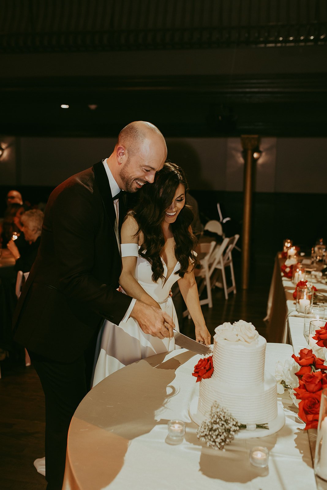 The-Great-Hall-October-Fall-wedding-Queen-West-reception-bride-groom-cake-cutting.jpg