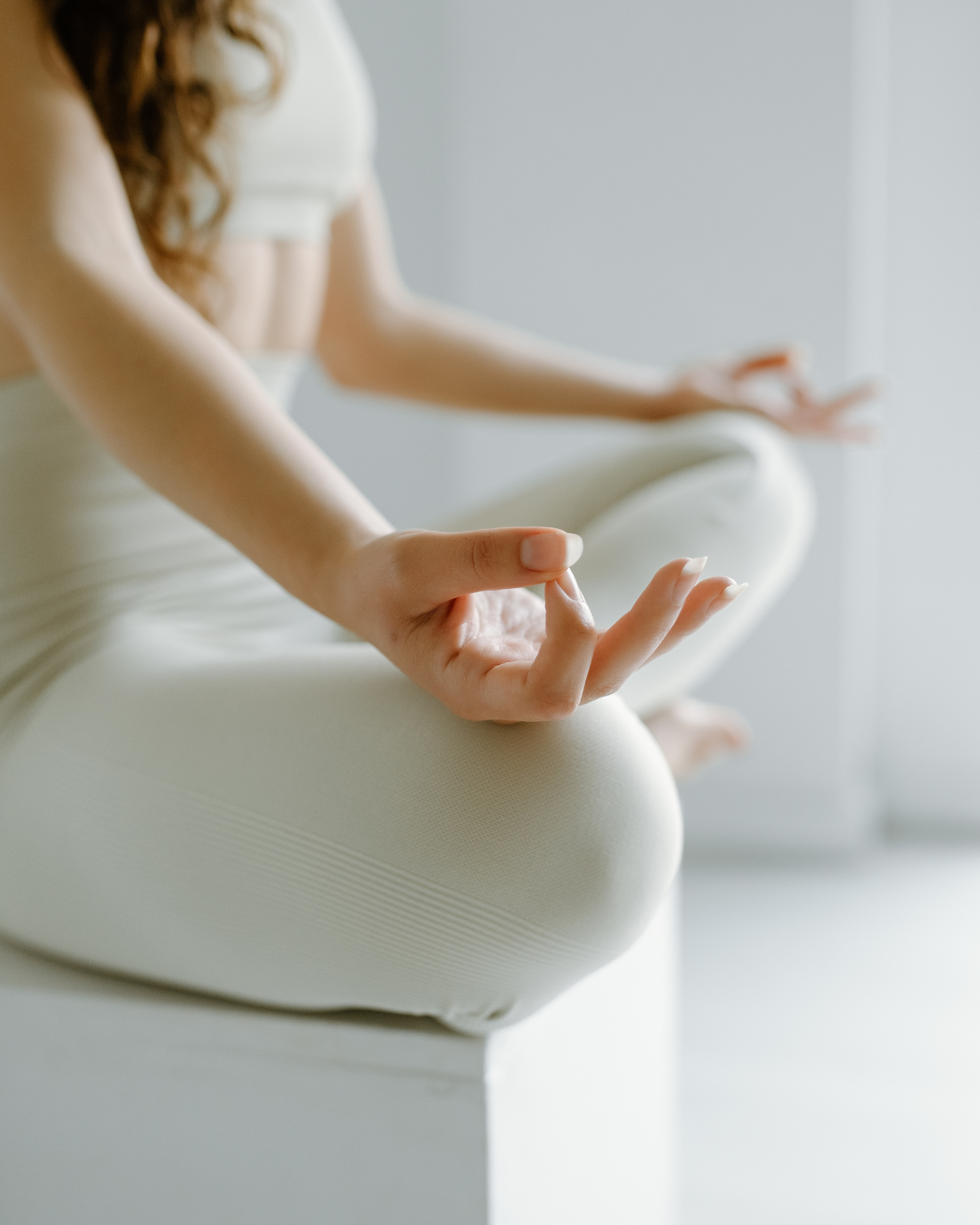Kundalini Teacher Training Students and Yoga Community at the Sunshine Haus Yoga and Meditation Studio in Austin, Texas meditating and practicing mudras