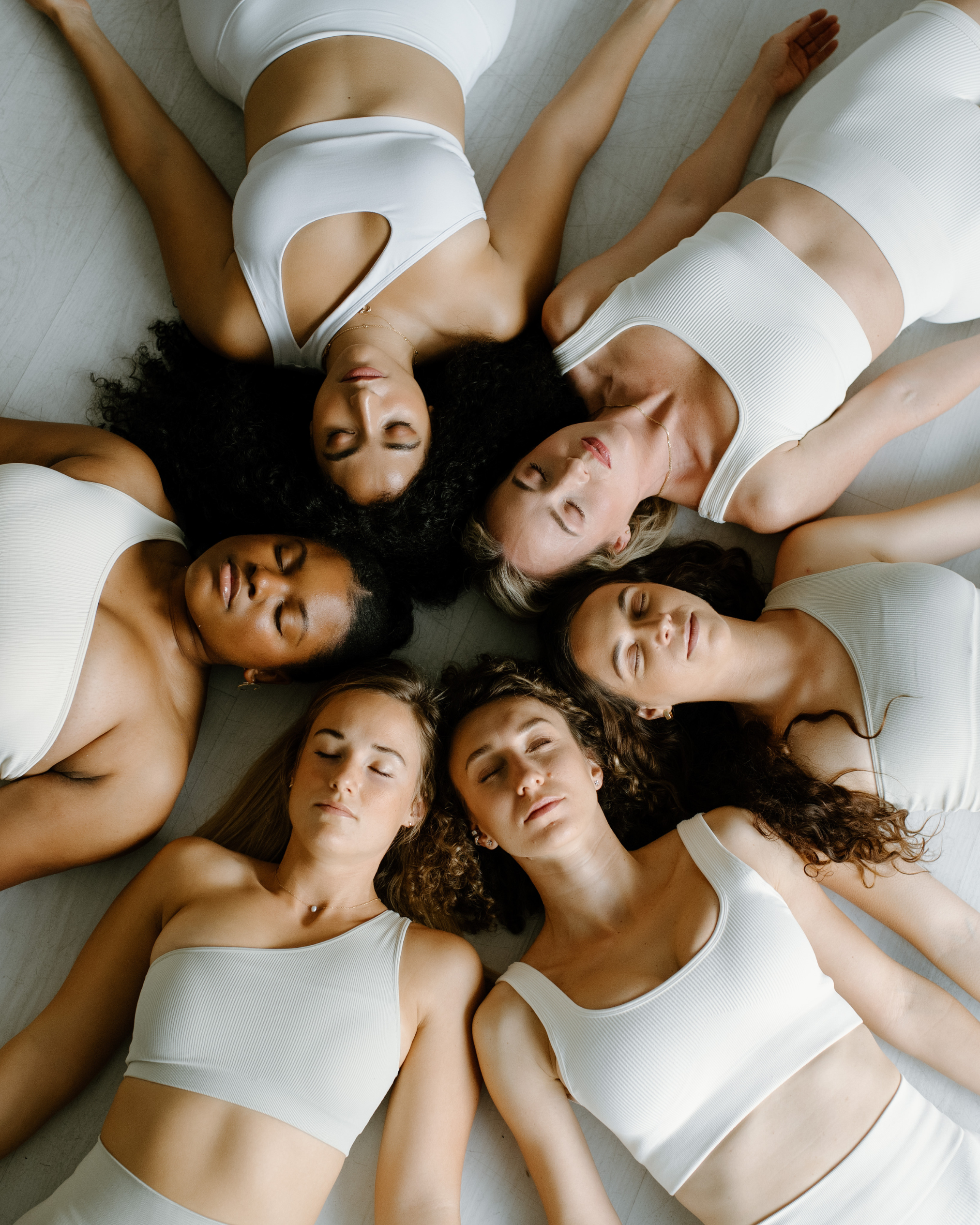 Kundalini Teacher Training Students and Yoga Community at the Sunshine Haus Yoga and Meditation Studio in Austin, Texas meditating and learning about yogic subtle anatomy and the ten light bodies