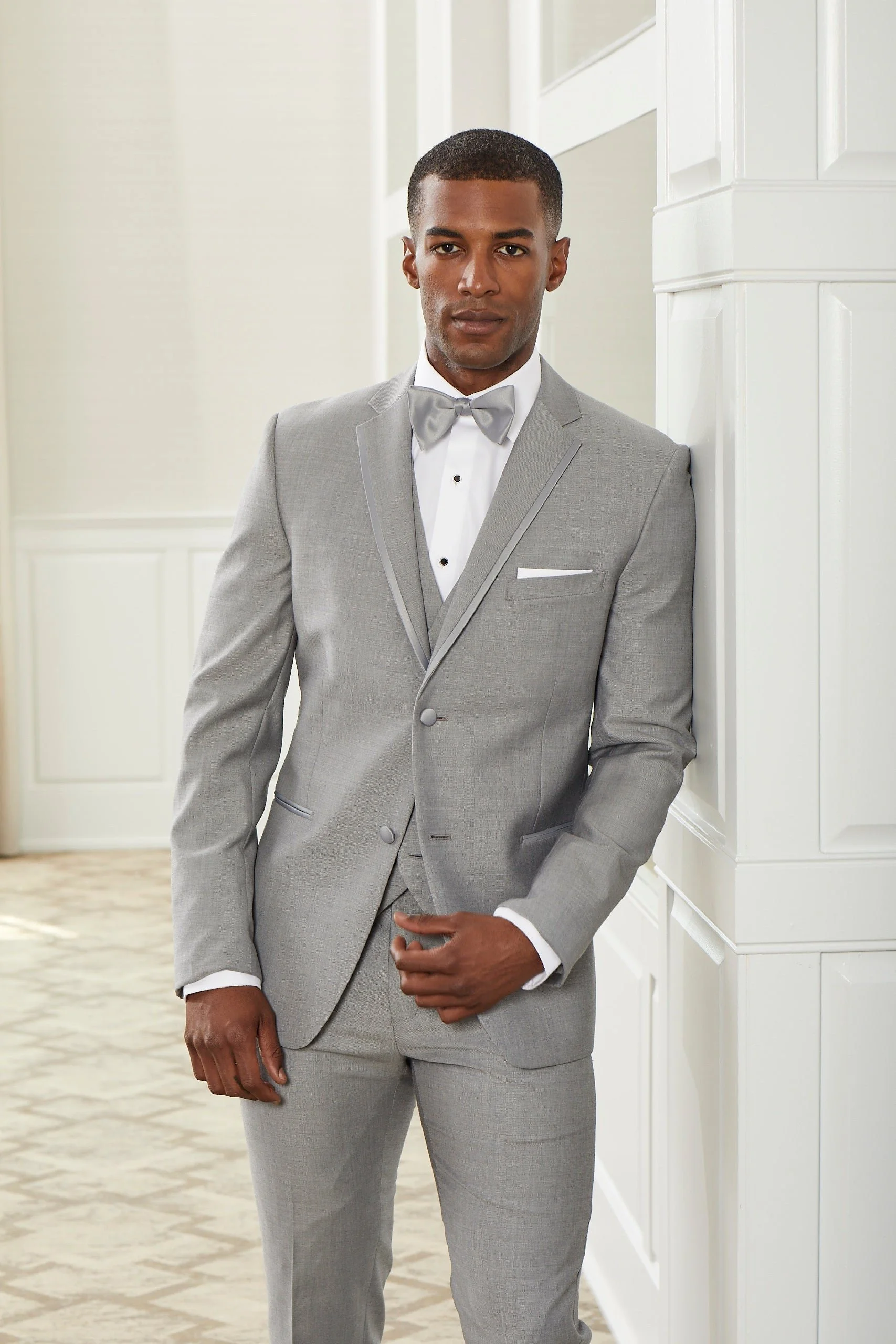 Lenox Ceremony Light Grey Style# 6828C
Features:
2 Button Front, Notch, Satin Framed Lapel, Side Vent
Matching Vest Available