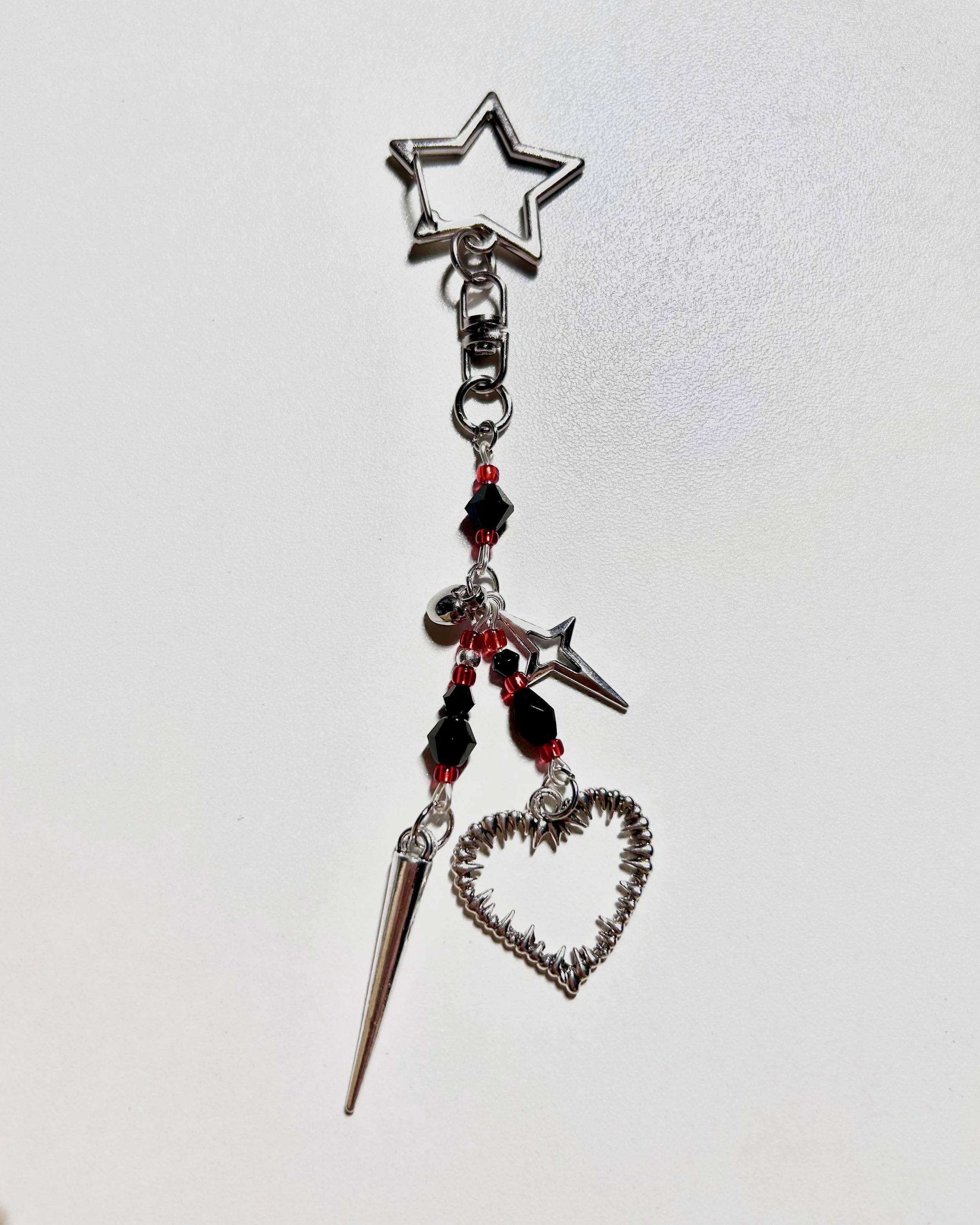stabbed in the heart keychain, 2025