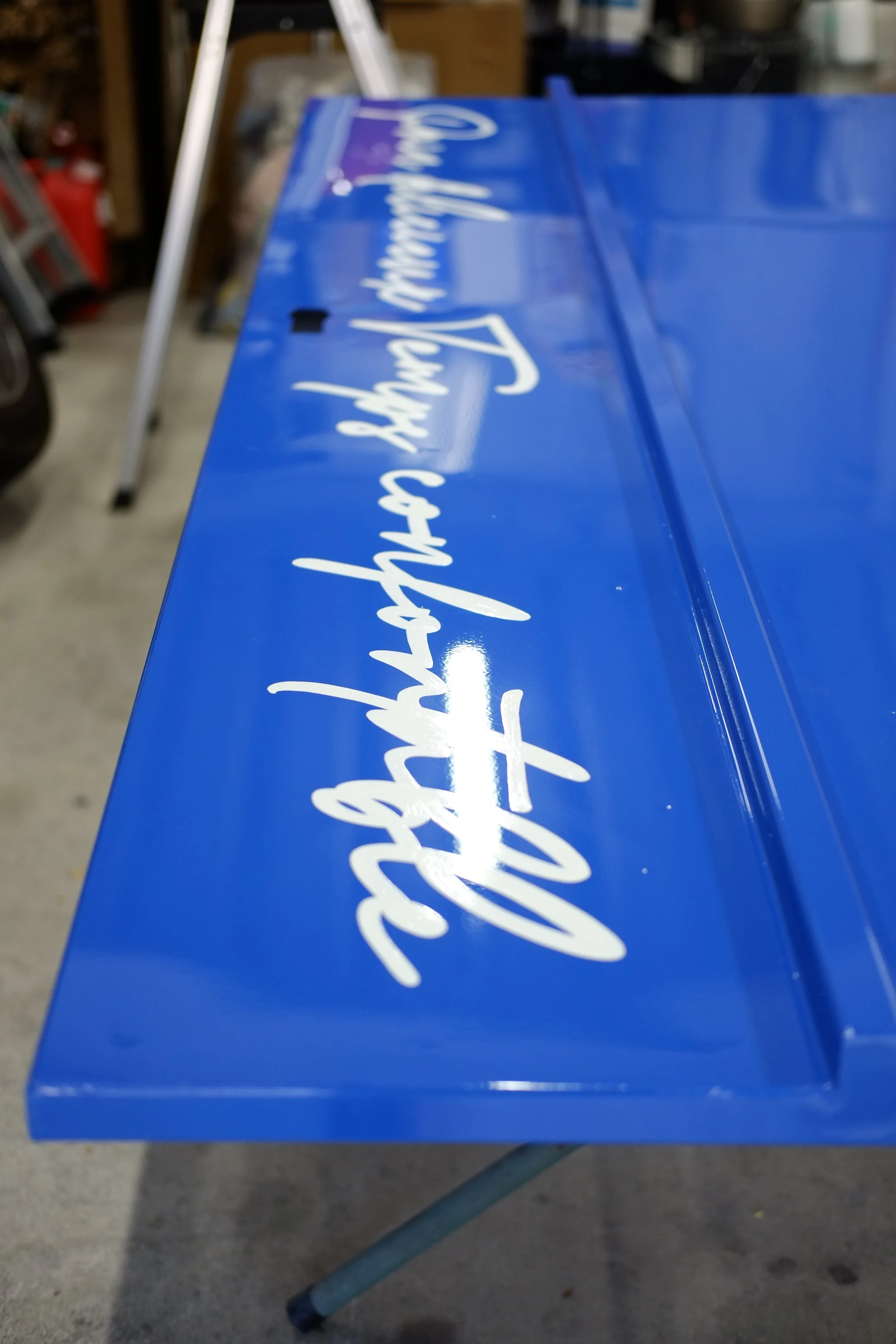 Hand painted sign for the food truck