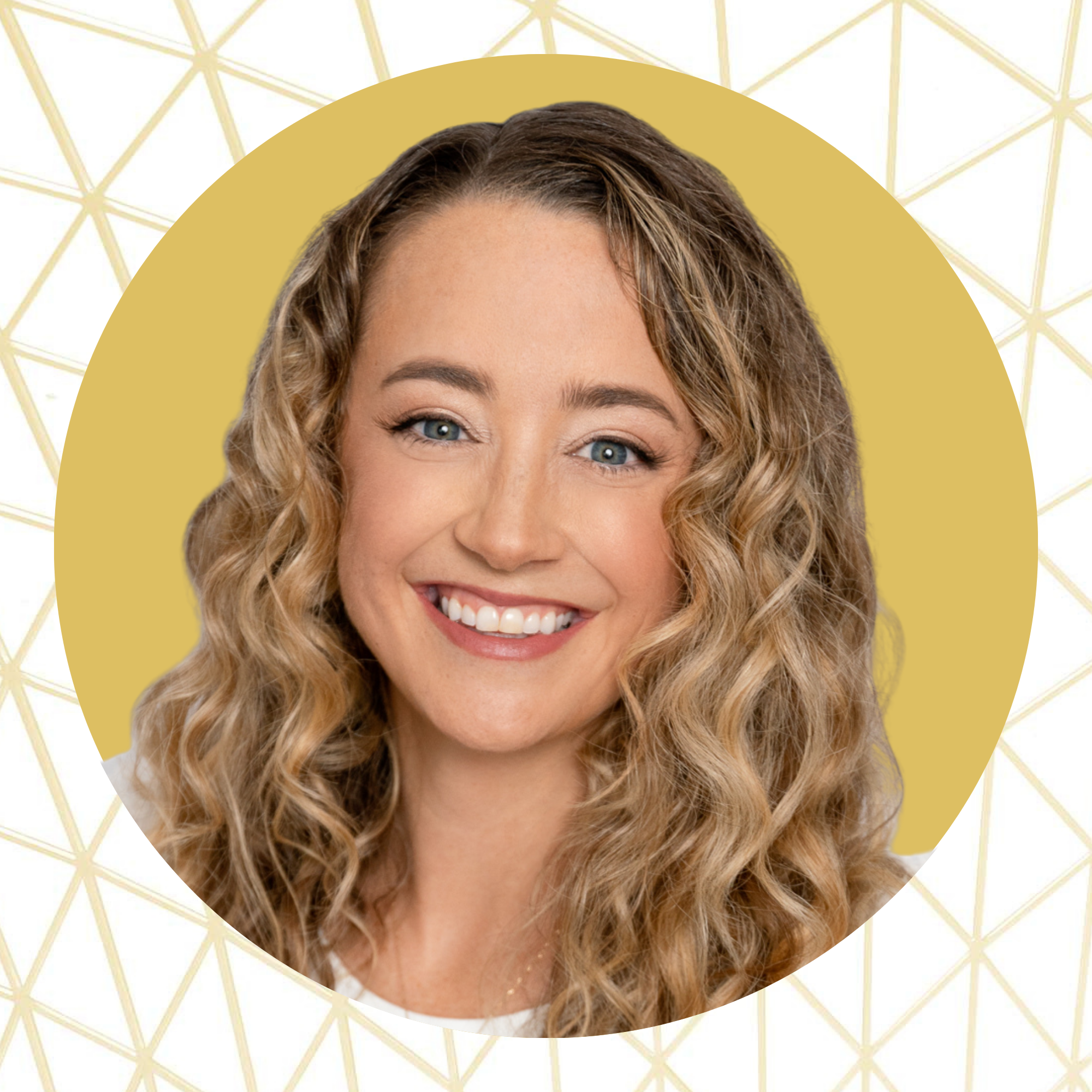 A woman with curly blonde hair, blue eyes, and a wide smile, wearing makeup and a casual white top, posed against a professional backdrop with a gold circle and geometric pattern.