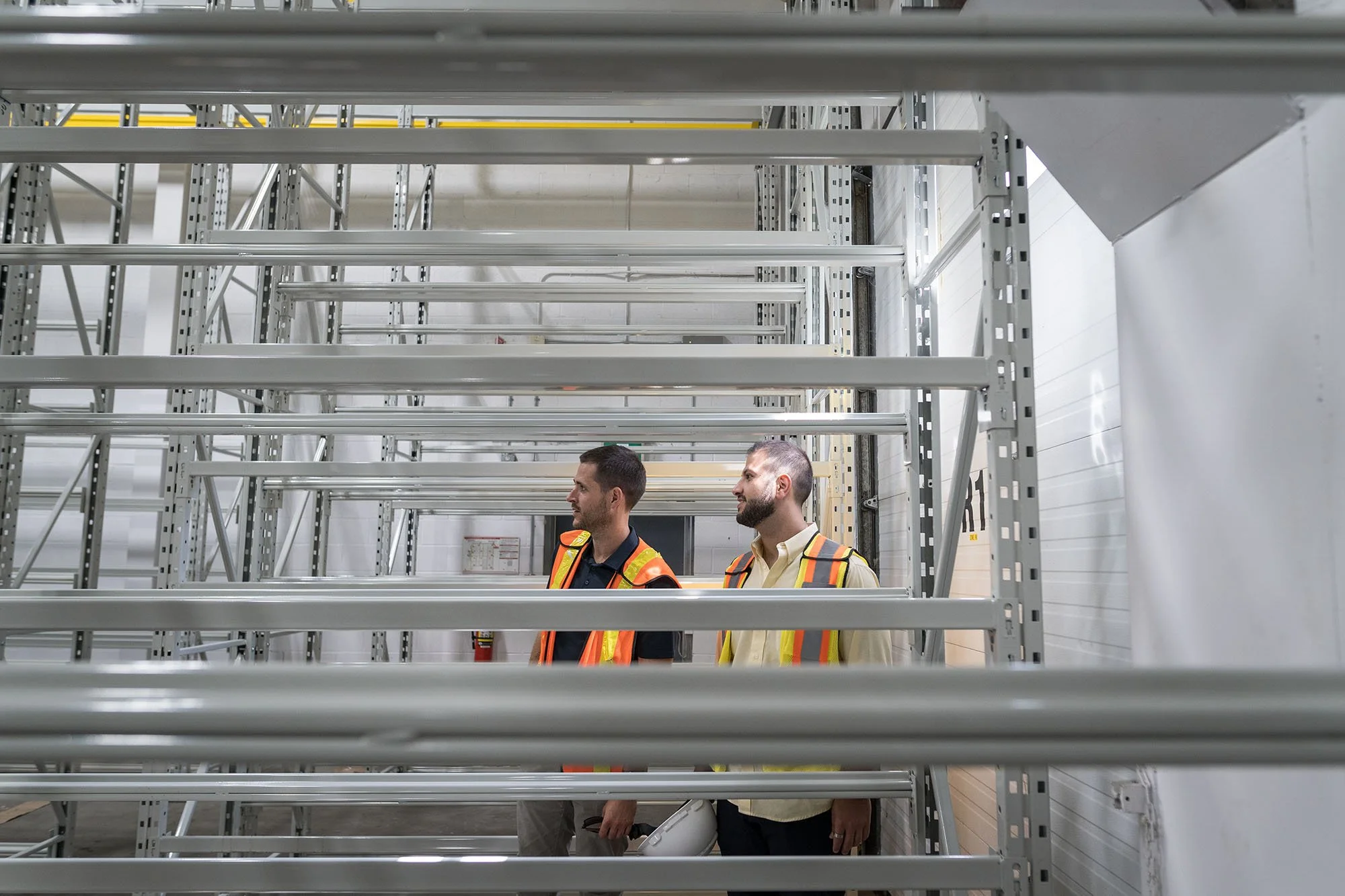 federal steel employee in racking warehouse
