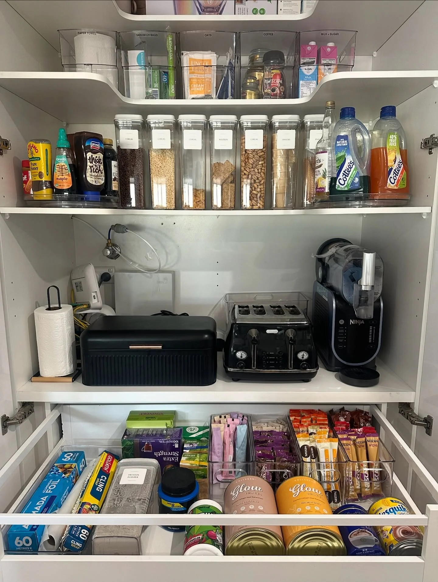 This family had two incredible cupboards in their kitchen - one overflowing as a pantry, and the other acting as the &ldquo;bits n bobs with no home&rdquo; cupboard. But as soon as I saw them, I knew the space wasn&rsquo;t being used to its full pote