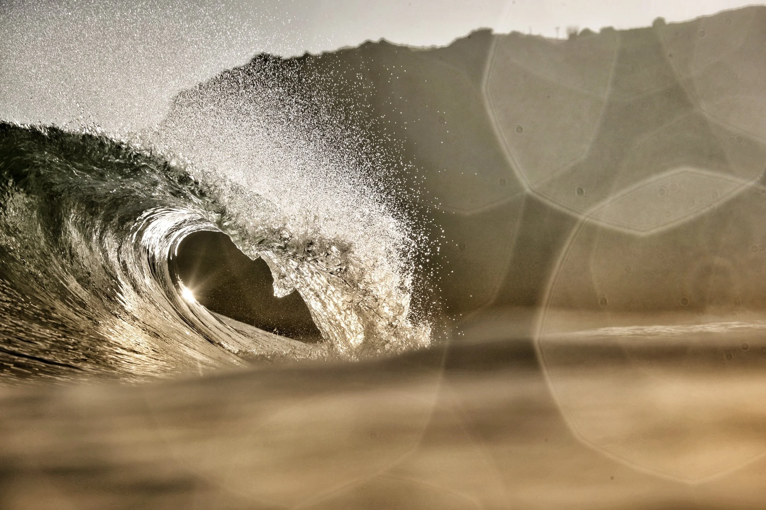 Sunlit barreling Atlantic wave