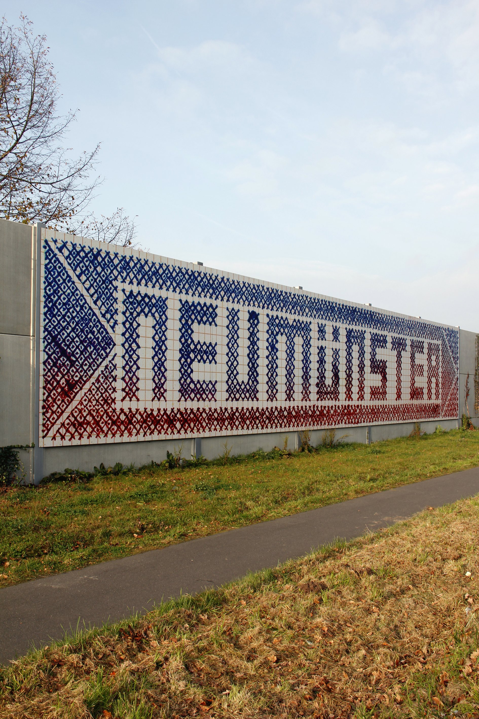 "Kreuzstich Neumünster", Lärmschutzwand, Print/Aluminium, Neumünster, 2017 (mit Chantal Labinski)