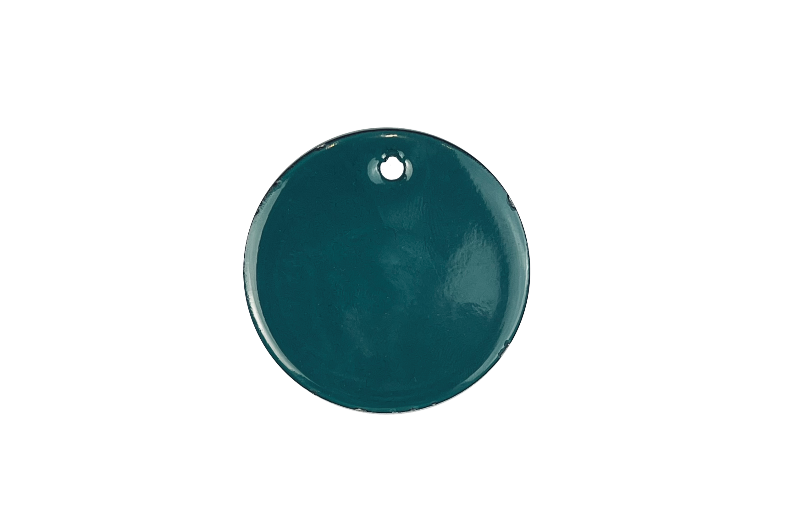 Close-up of a blue, oval-shaped, plastic object with a small hole at the top.