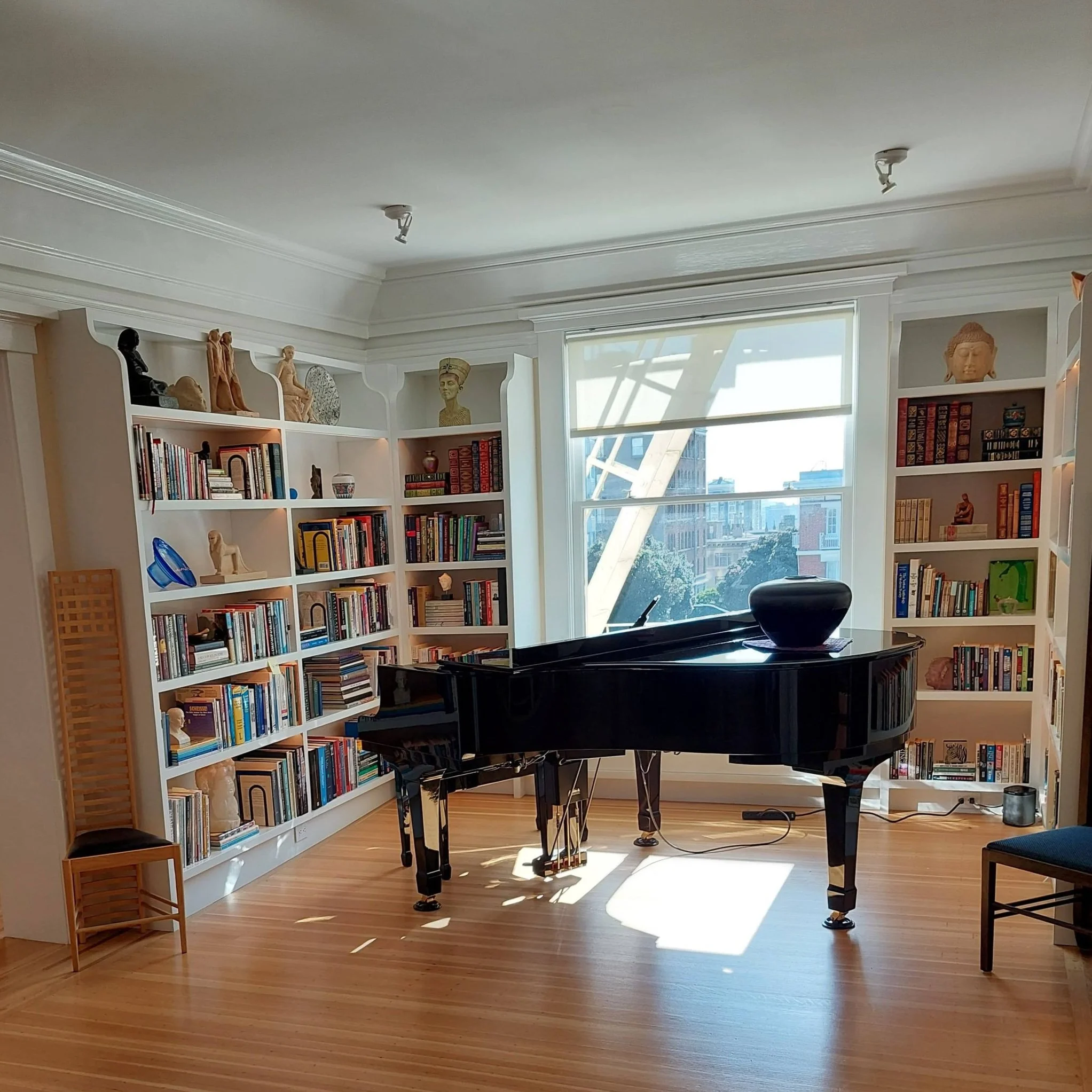Piano installed in library- closed with sun.jpg