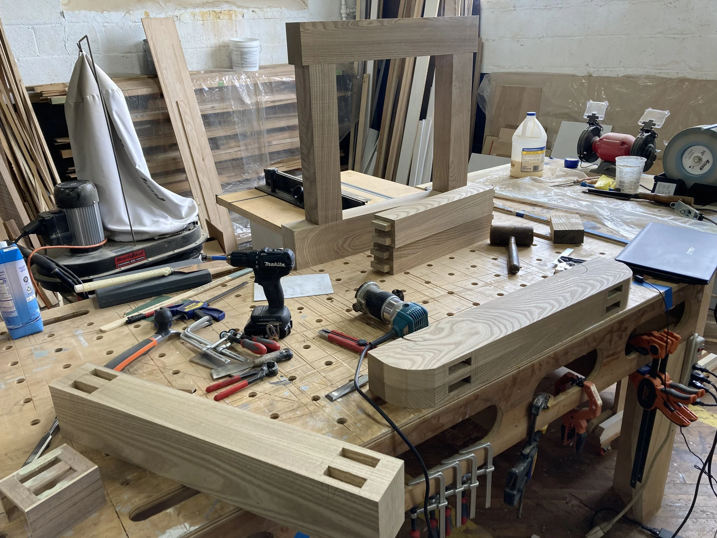 Woodworking workshop with tools and wooden parts