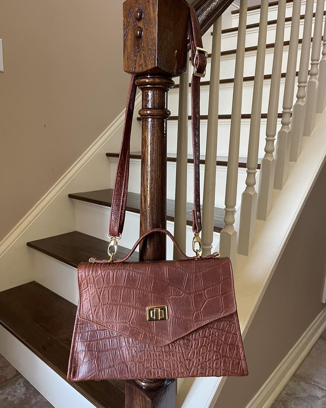 I recently tried out a new pattern I found to make this elegant purse! The exterior is an embossed &ldquo;crocodile&rdquo; leather and the interior is a gorgeous blue print that I just love. This bag can be carried as a handbag or as a shoulder/cross