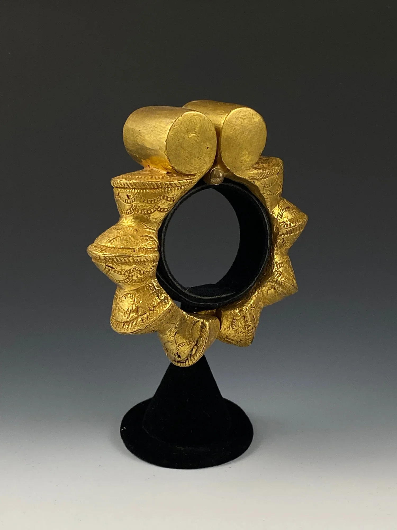Asante hinged bracelet (Babadua), cast gold, 7.9 cm. This design represents the segmented cane babadua and is usually associated with queen mothers, strength, and resilience. Ex Rudolf and Leonore Blum, Zumikon, Switzerland