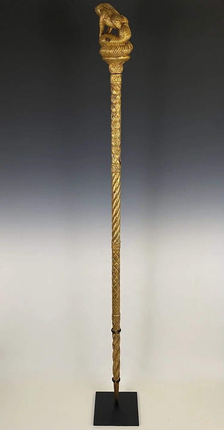 “Okyeame poma” (linguist/orator’s staff). Wood, gold foil. Ghana. 59 inches H. “Magnificent gold-covered staffs like this one are carried by high-ranking officials within the courts of Akan chiefs in an area of West Africa once known as the Gold Coas