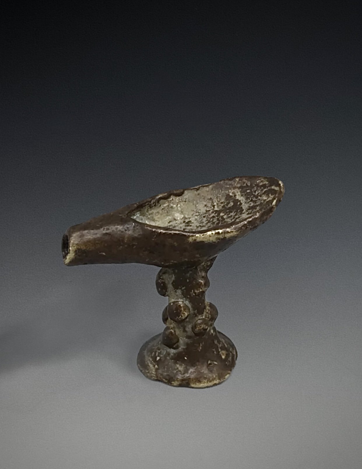 Asante copper alloy gold weight in the form of an oil lamp. 35mm H. Ex UK private collection.