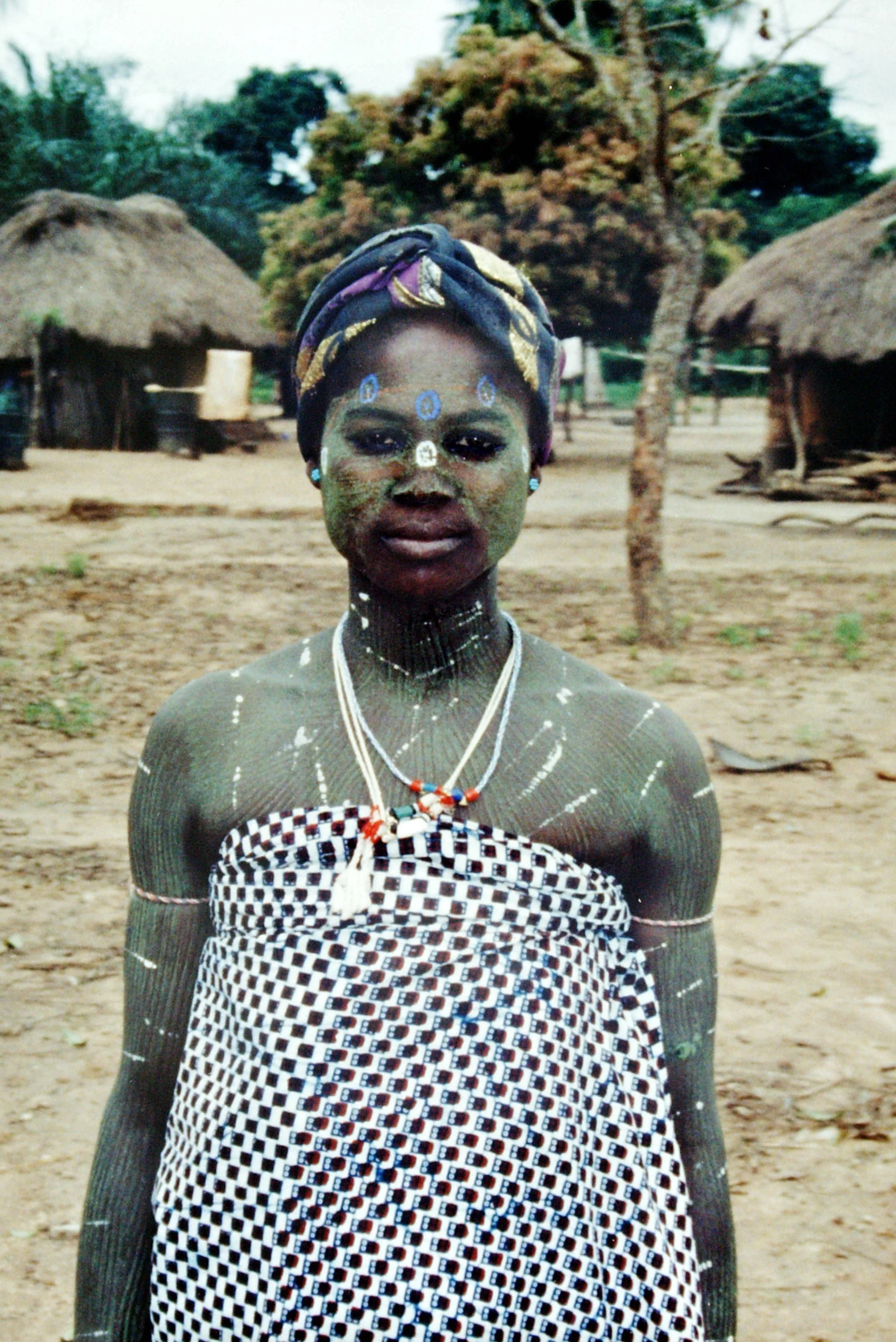 A rare female féticheur in the village of Essikro, Côte d'Ivoire, 1999.