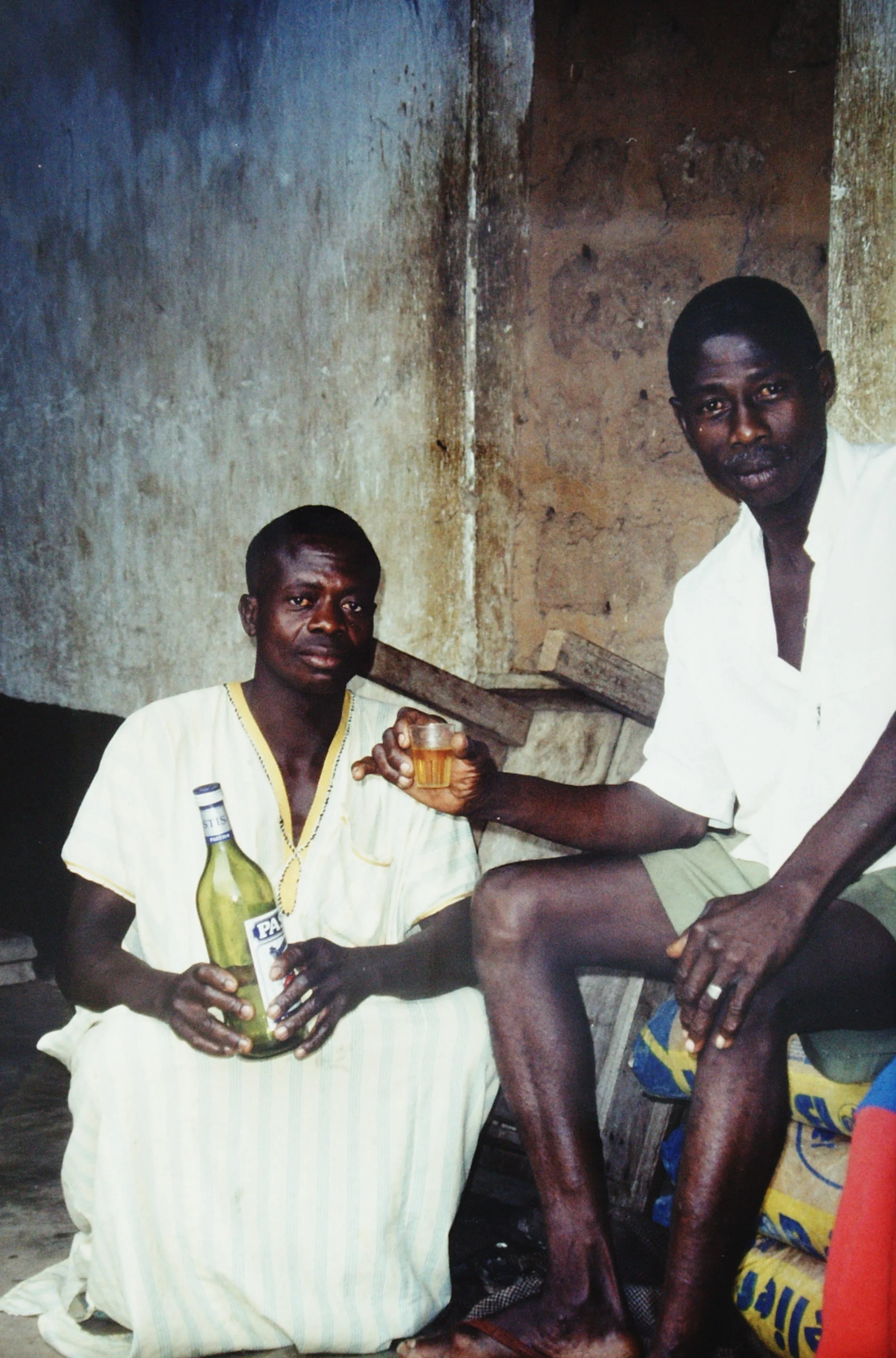 Having some drinks in Essikro, Côte d'Ivoire 1999