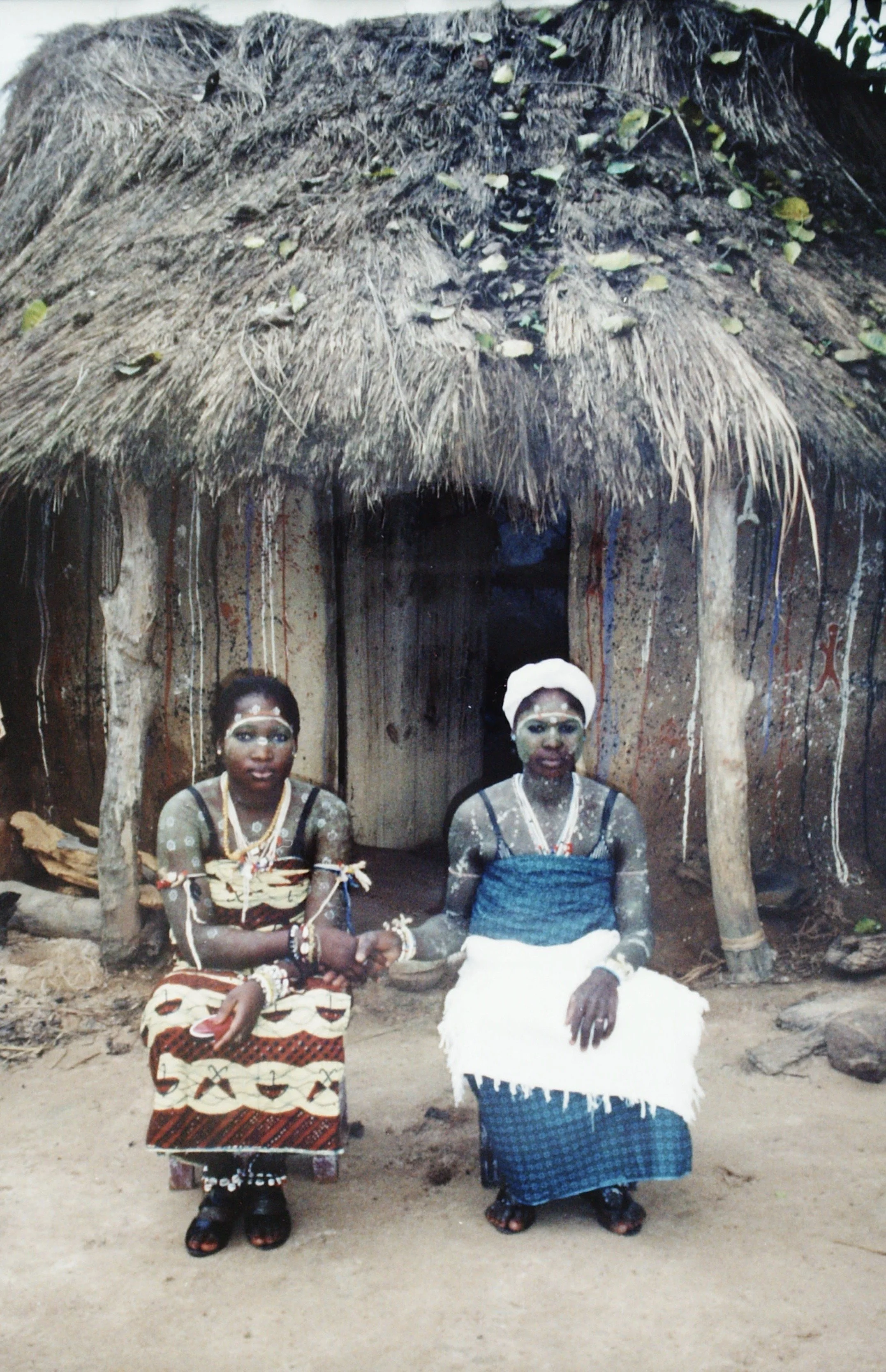 A rare female féticheur and her female apprentise in the village of Essikro, Côte d'Ivoire, 1999