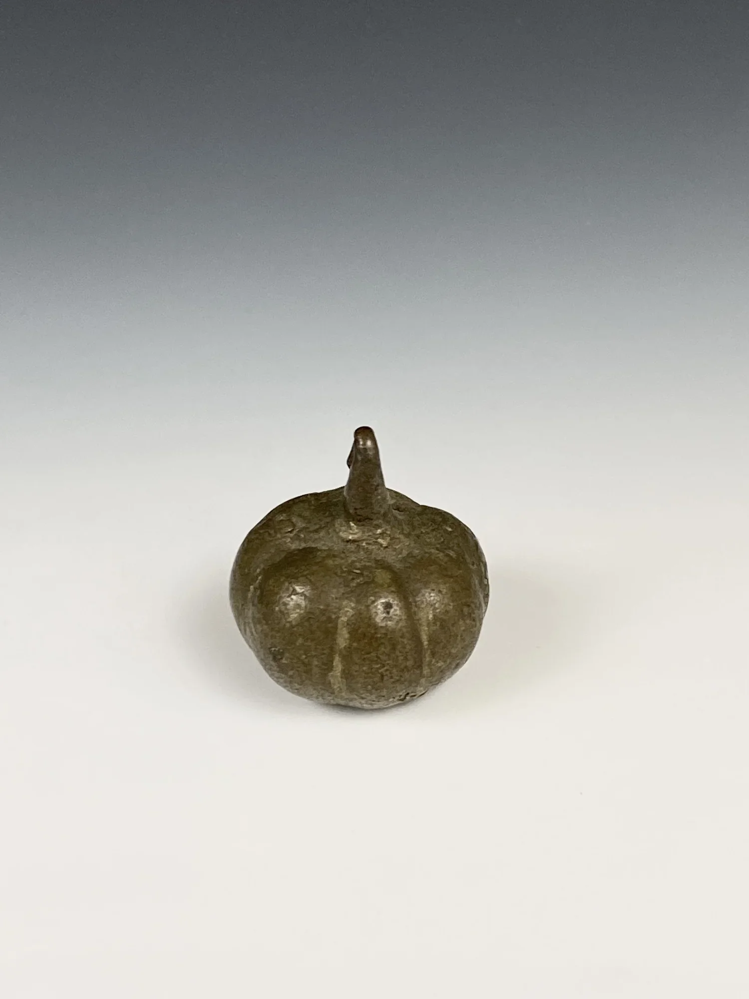 Asante gold weight in the form of a pepper (direct cast from nature), 1 in. Provenance: Davis Gallery of Ethnographic Art, New Orleans, Nov. 1981; Estate of Curator Scholar and Advocate of Outsider and Contemporary Art Bill Fagaly, sold to benefit Pr
