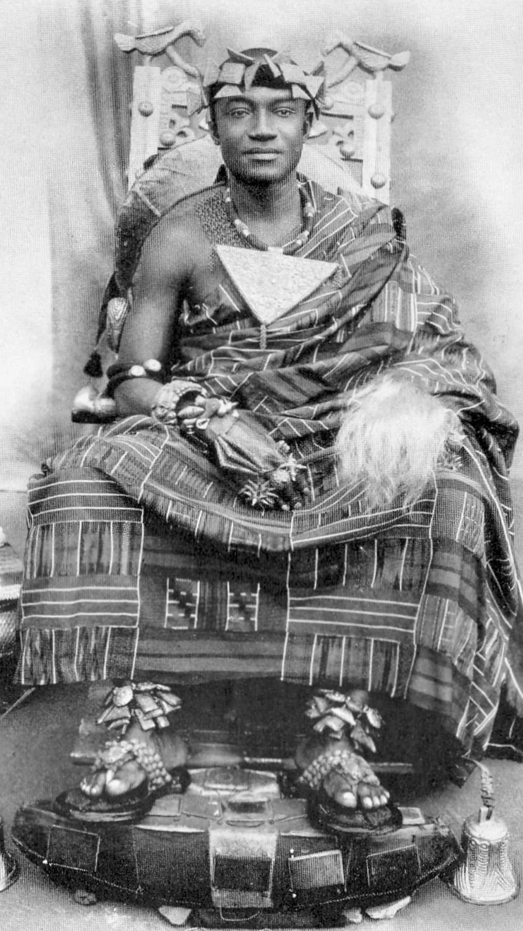 The Asantehene Nana Otumfoe Sir Osai Agyemang Prempeh II  wearing Kente.