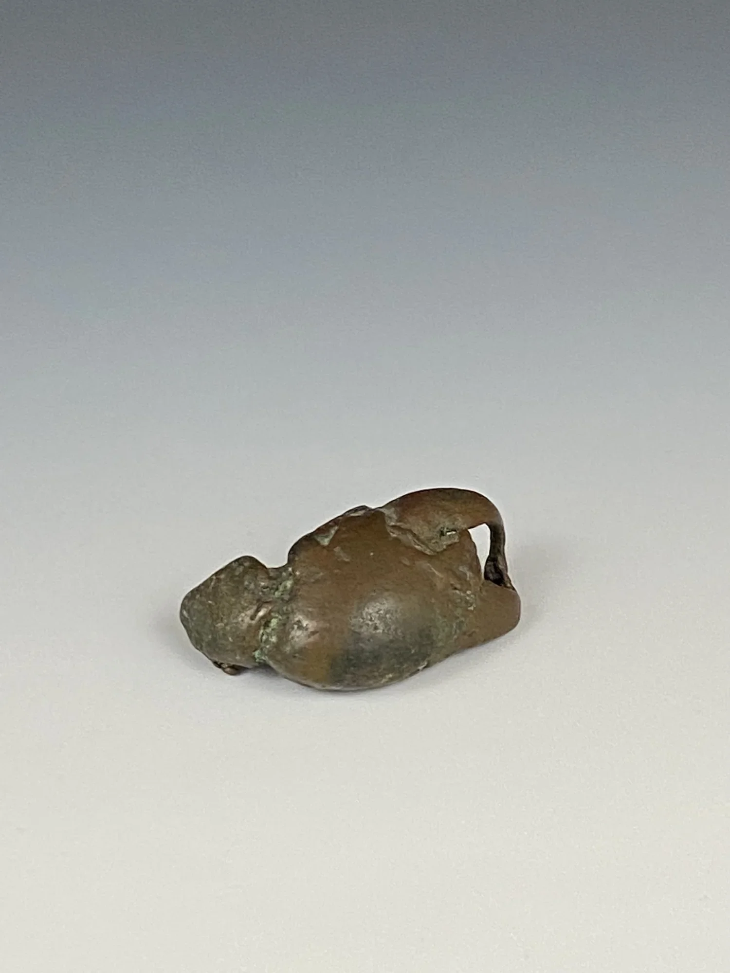 Asante bronze gold weight in the form of a crab claw, 1 1/4 in. Provenance: E. Lorenz "Larry" Borenstein, New Orleans, Nov. 1973; Estate of Curator Scholar and Advocate of Outsider and Contemporary Art Bill Fagaly, sold to benefit Prospect New Orlean