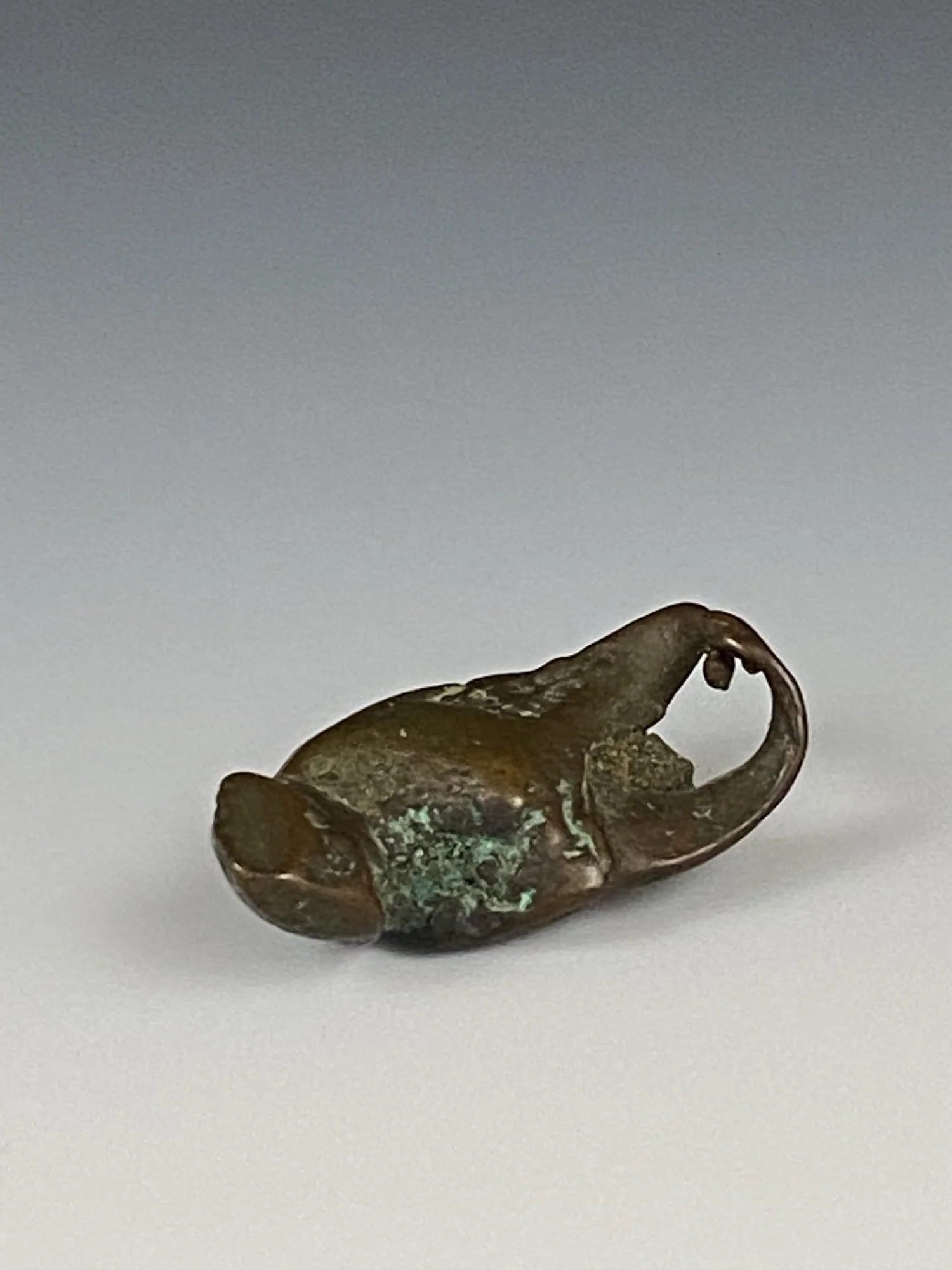 Asante bronze gold weight in the form of a crab claw (direct cast from nature), 1 1/4 in. Provenance: E. Lorenz "Larry" Borenstein, New Orleans, Nov. 1973; Estate of Curator Scholar and Advocate of Outsider and Contemporary Art Bill Fagaly, sold to b