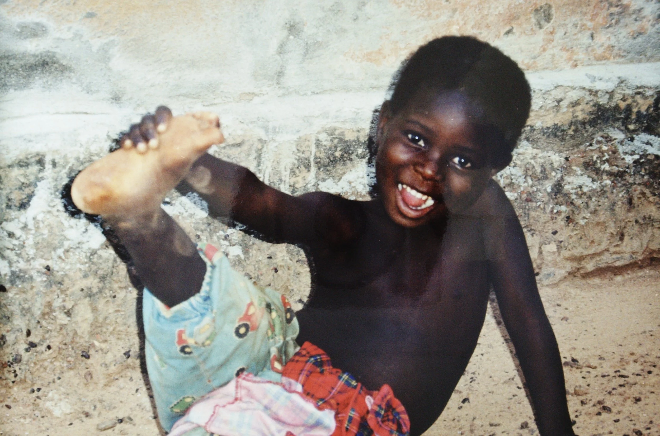 a young Agni boy in the village of Essikro, Côte dIvoire 1999.