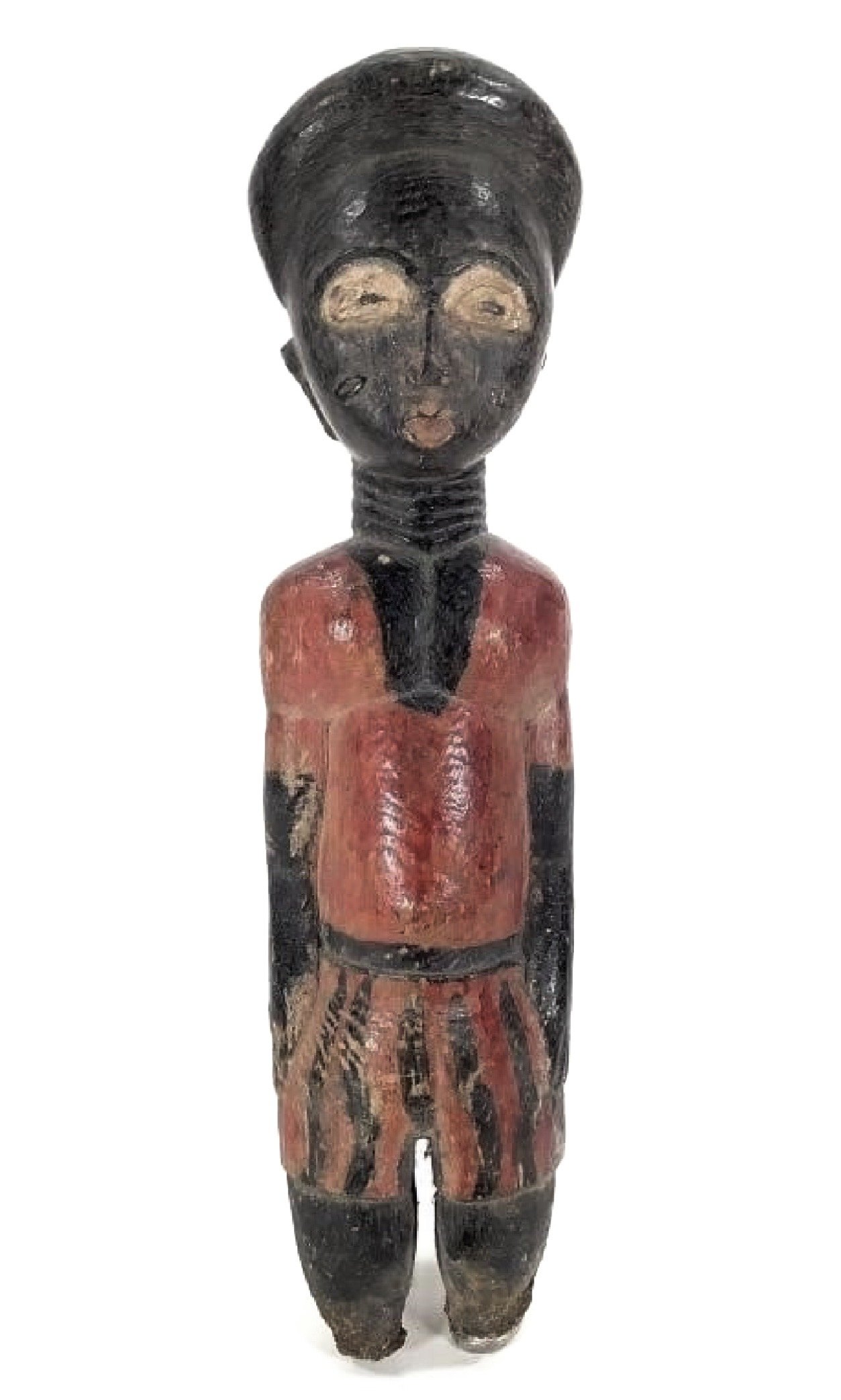  Baule “colon” figure. 10.5” H from Côte d’Ivoire. Wood and pigment. Damaged: missing feet and base. This figure depicts a colonial era Ivorian in European apparel.  Colon (colonist) figures emerged during the colonial period, particularly under Fran