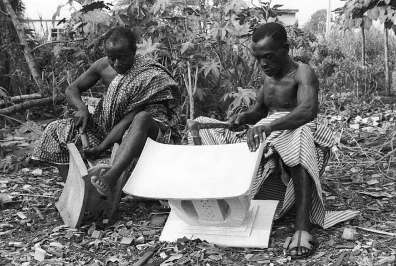 Carvers carving the Asante royal stools near Kumasi, ca. 1971.  Eliot Elisofon