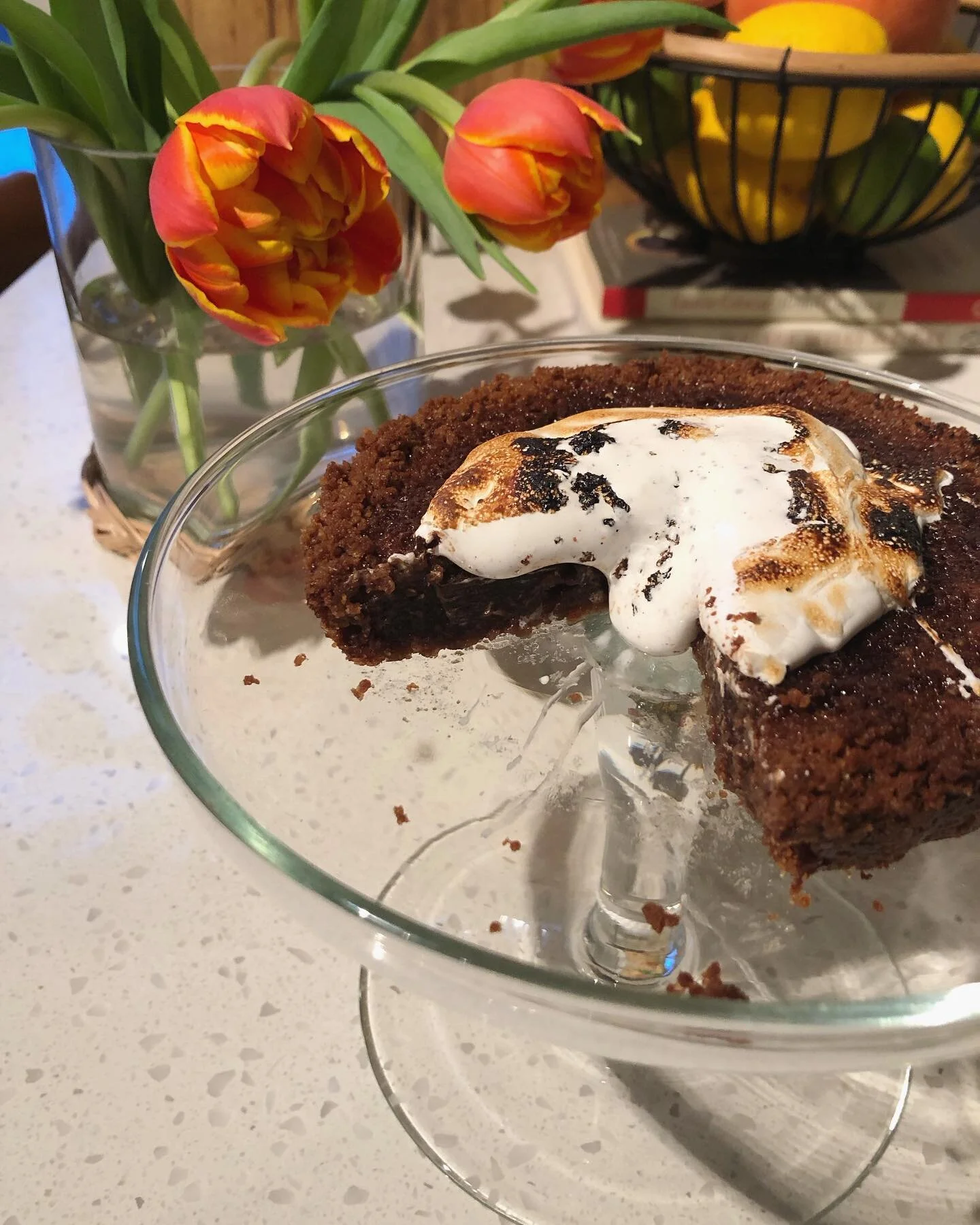 🍫☁️ Our Smokey S&rsquo;mores Pie (w/ a gluten free graham cracker crust, gooey chocolate center, + charred marshmallow on top) is making its debut this weekend! 

We were going to photograph it with a real bonfire, but go figure: it&rsquo;s a windy 