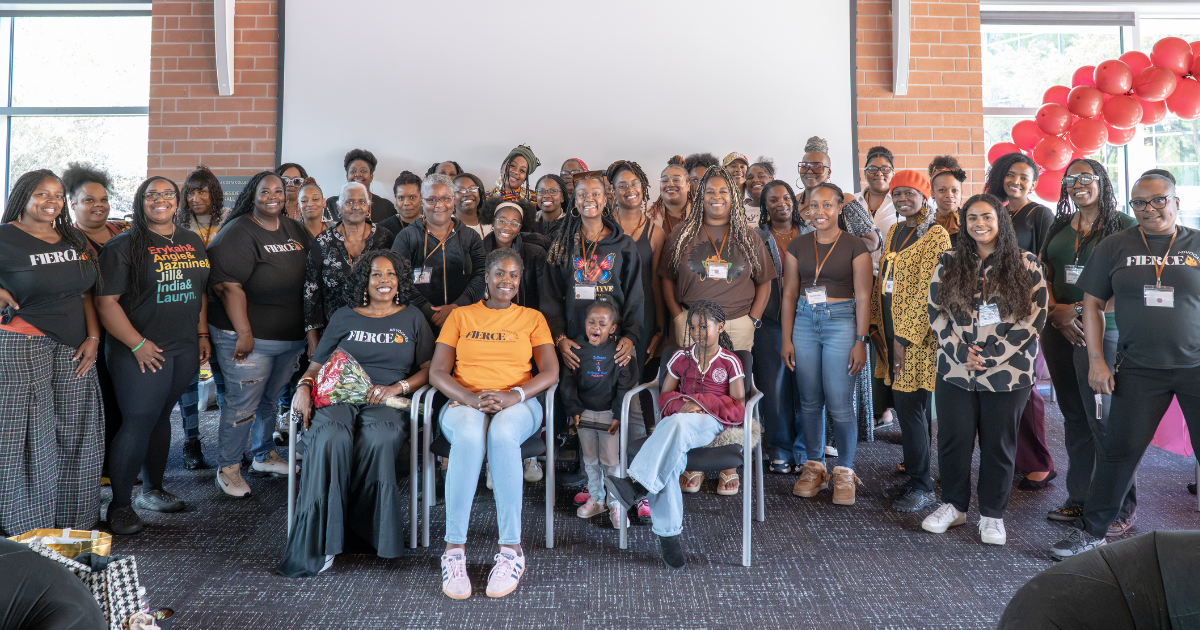 Attendees and facilitators gather for a group photo at the 2026 Black Women’s Sanctuary Conference.