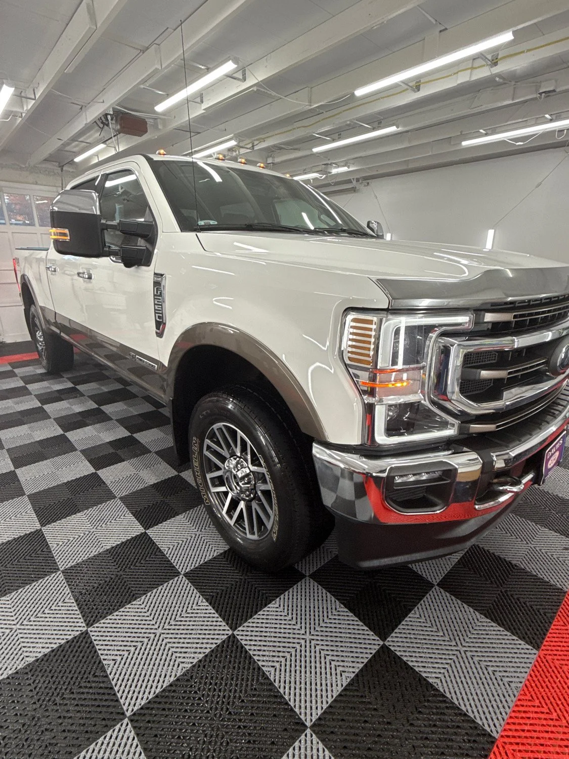 Ford F-250 truck after professional exterior detailing with polished paint and protected finish