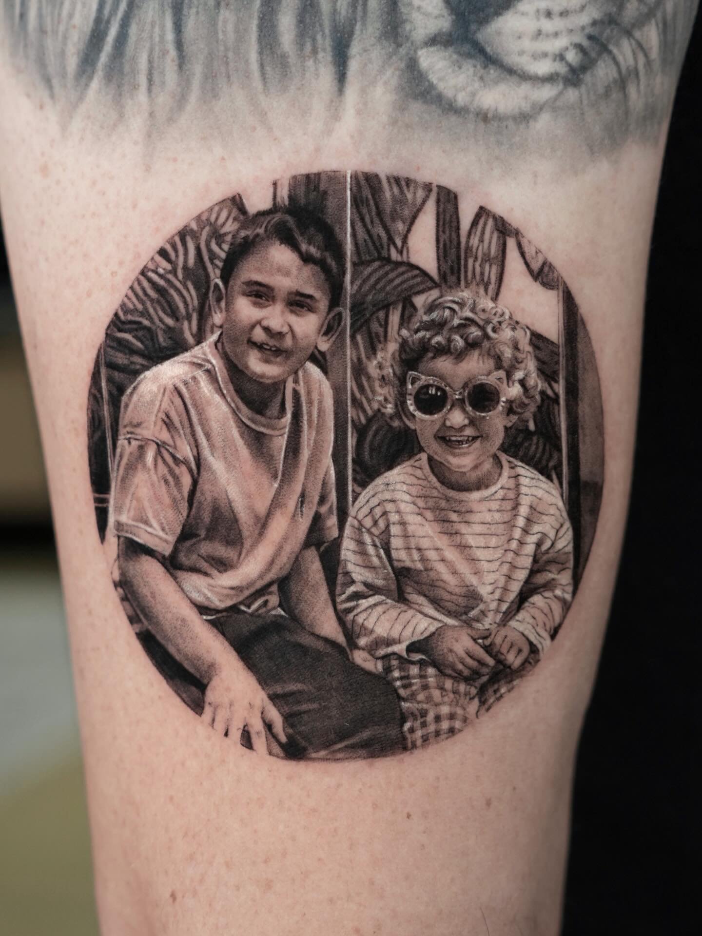 🖤

Inquiry link is in bio
Done at @dot.creativegroup 

#tattoo #photorealism #detailedtattoo #kidstattoo #microrealism #portraittattoo #phototattoo #nyctattoo #goldy #inked #skinart