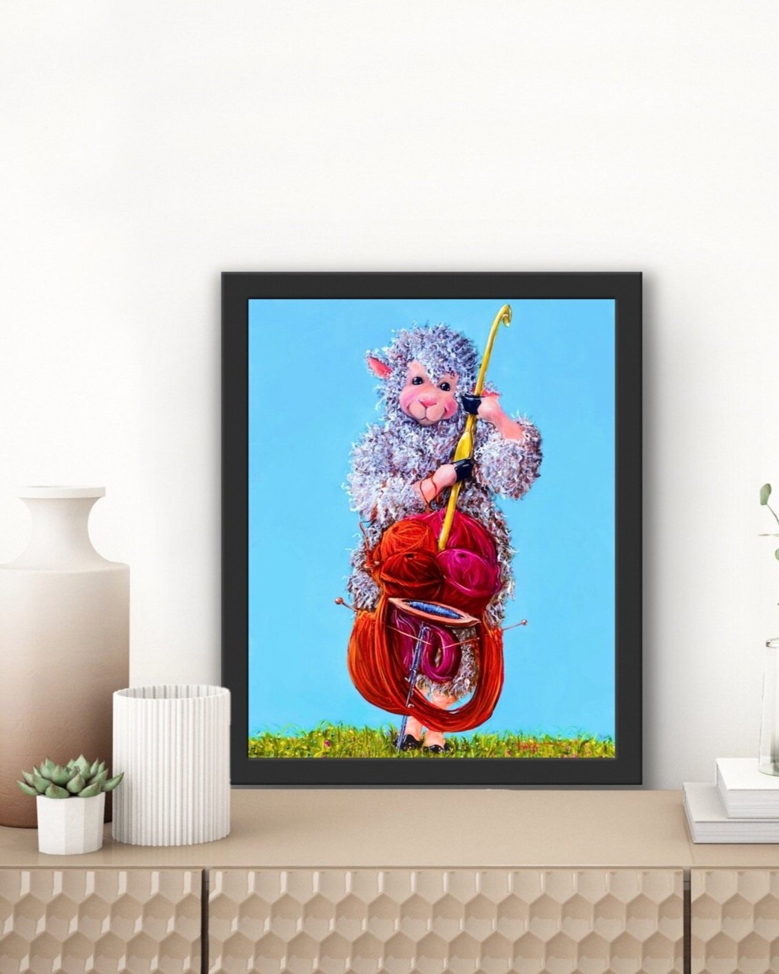 Sheep Playng a Cello made from Yarn and Knitting Needles