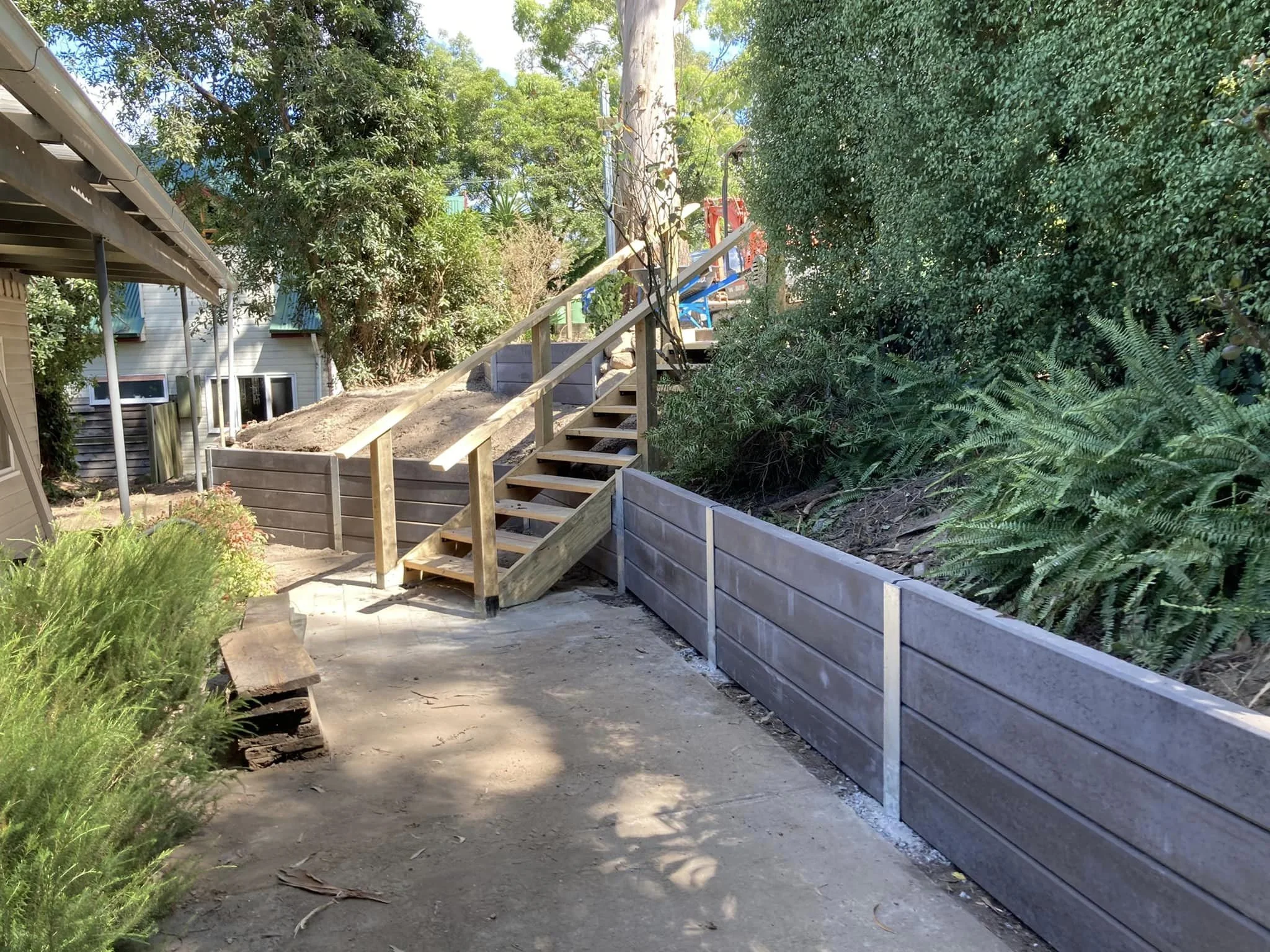 Cement sleeper retainer wall