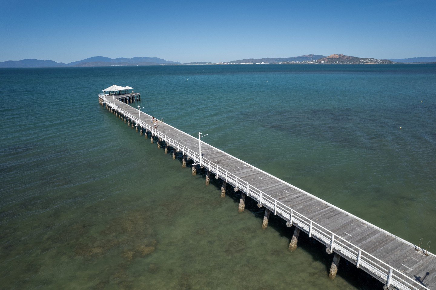 School Holidays on Magnetic Island 6/7: Fishing and Jetty Fun 🎣⁠
⁠
The Picnic Bay Jetty is a perfect spot for family fun. Cast a line, watch the boats glide by, or just enjoy the ocean breeze together. Keep an eye on the fish swimming below and take