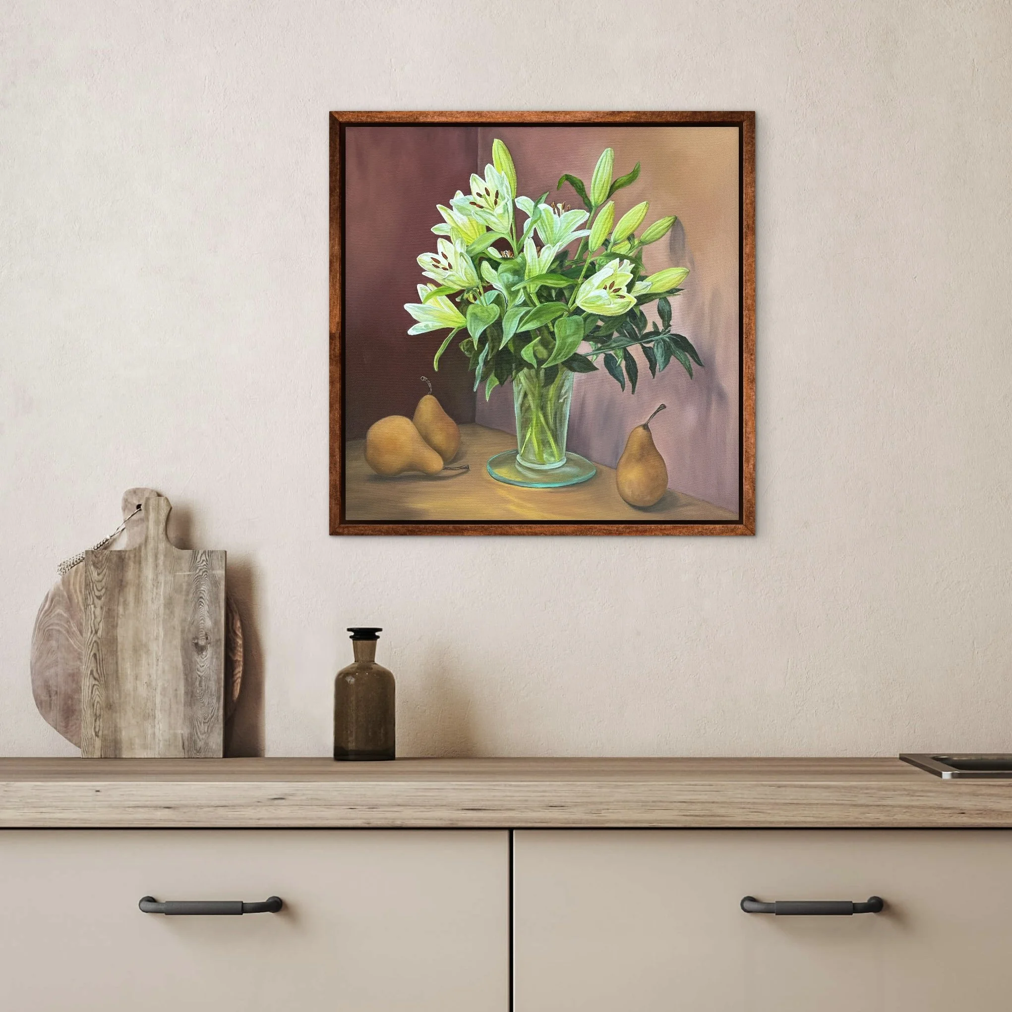 commissioned painting of lilies and pears on wall above kitchen bench with cutting boards and bottle