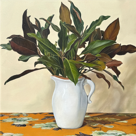 fine art print by Robyn Markey of magnolia leaves in white vase on orange floral fabric