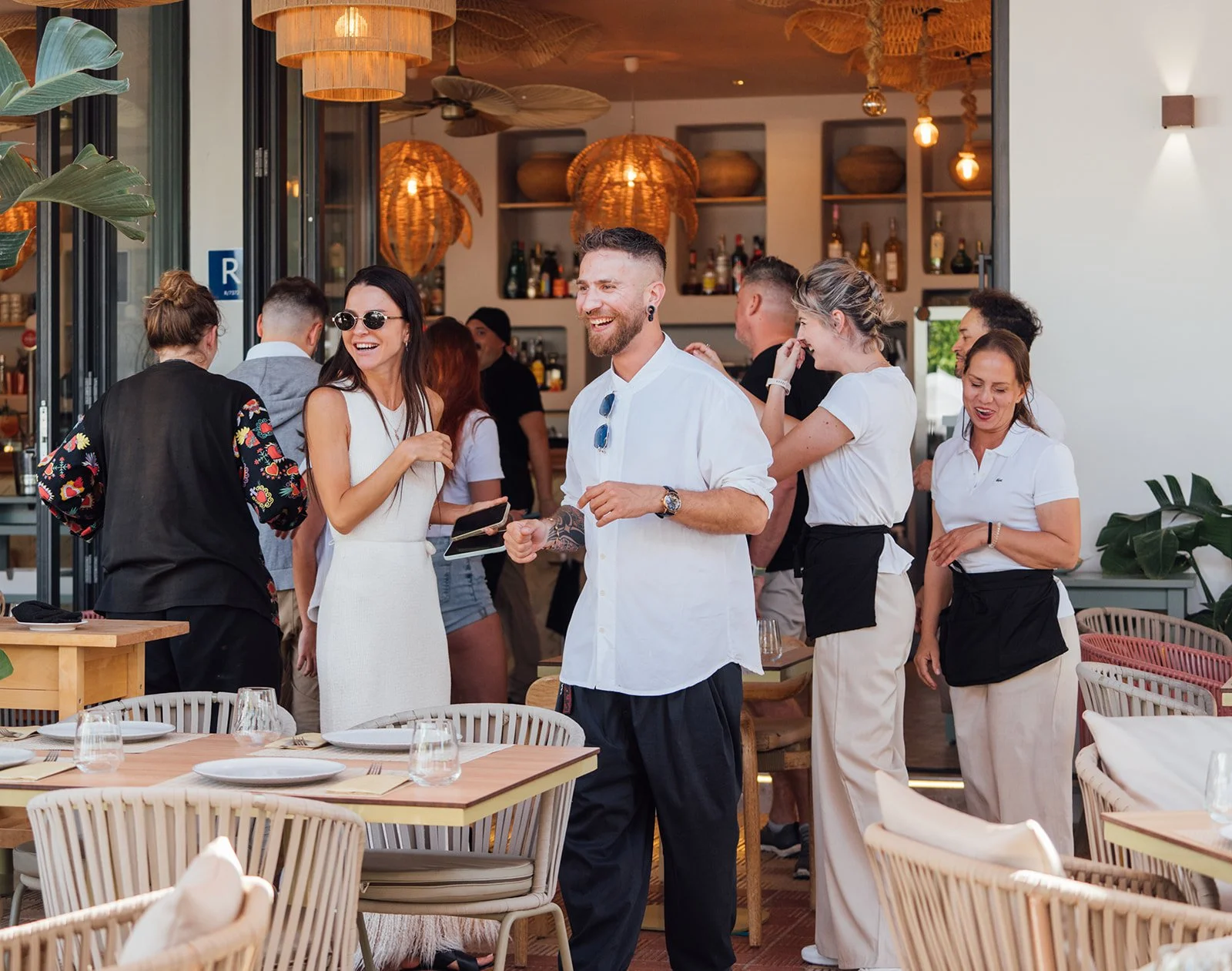 Relax with tapas, wine, and cocktails in a lively beachfront atmosphere.