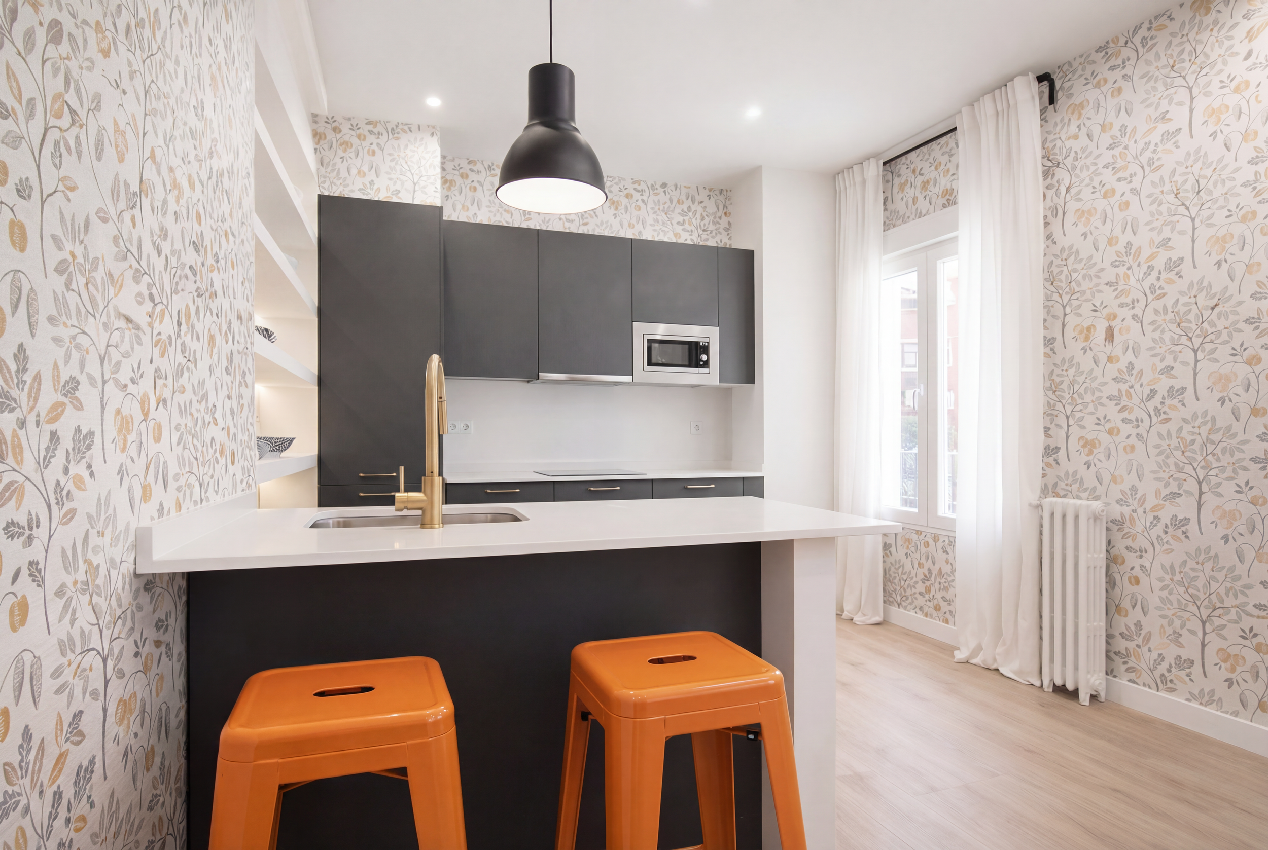 Render_a_House_A_modern_kitchen_with_bold_orange_stools_and_floral_wallpaper_Apr_28th.png