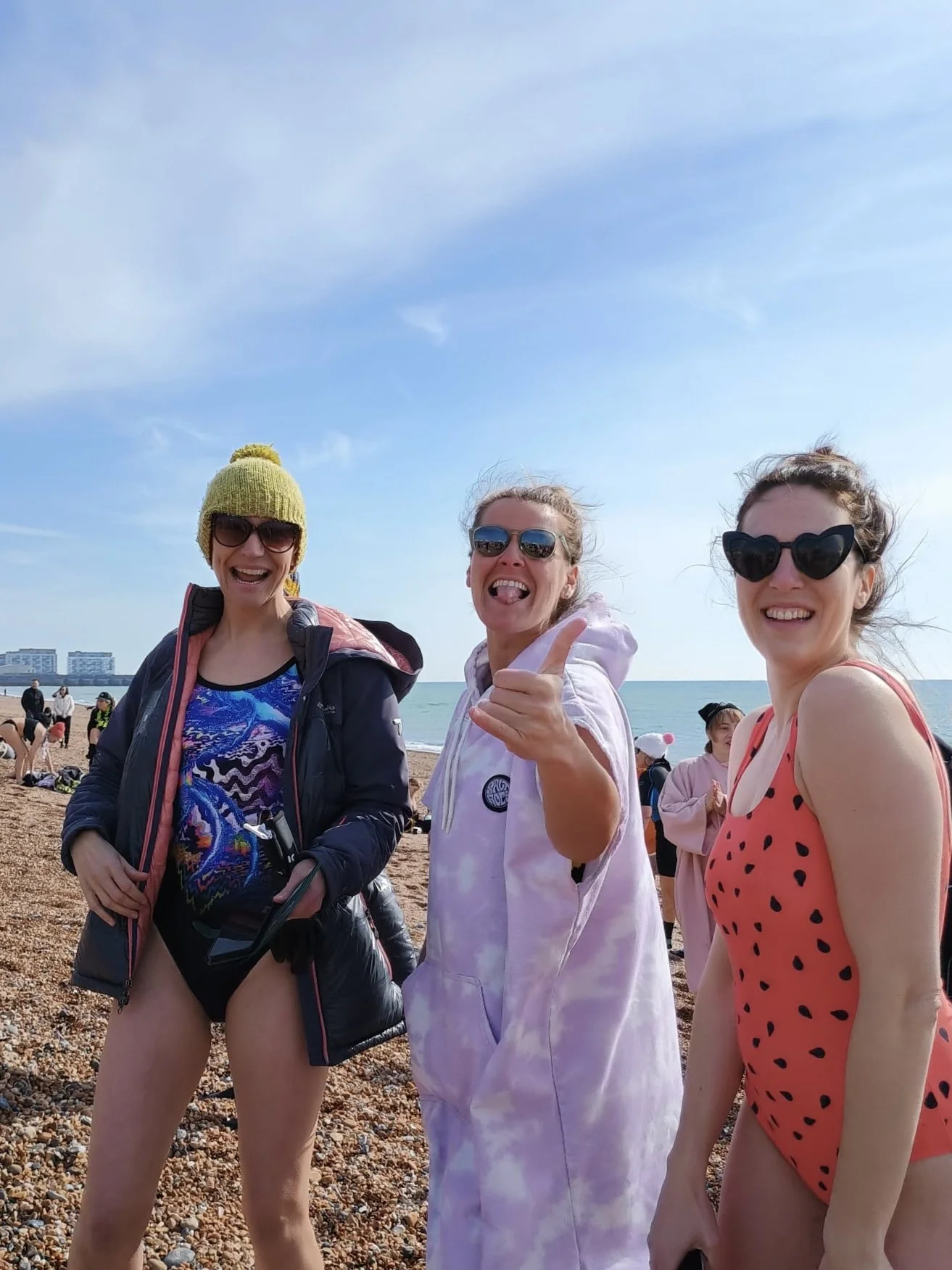 shaka on beach about to dip for international women's day