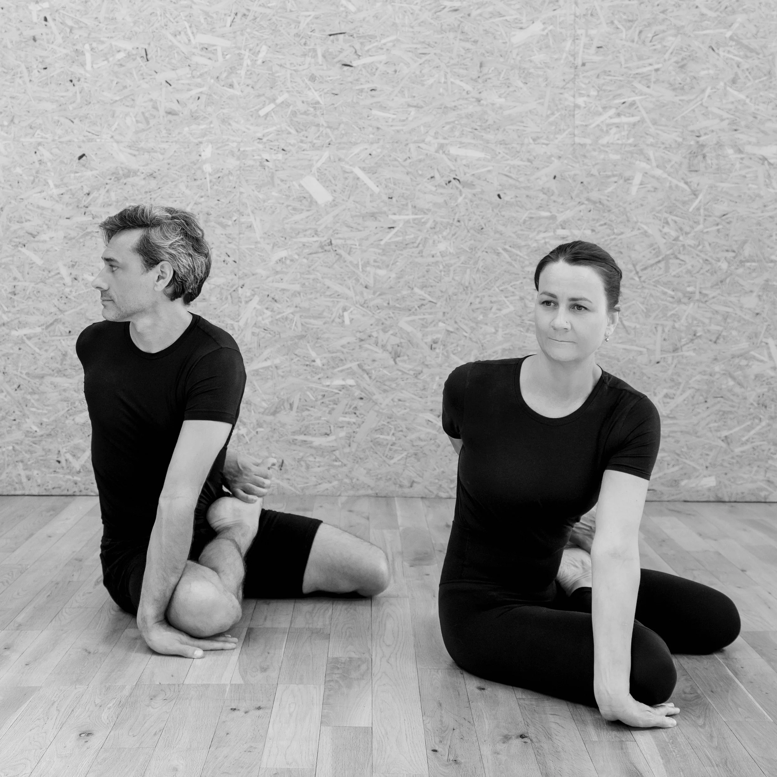 Charlie Taylor an experienced private yoga teacher in Bharadvajasana, a seated spinal twist