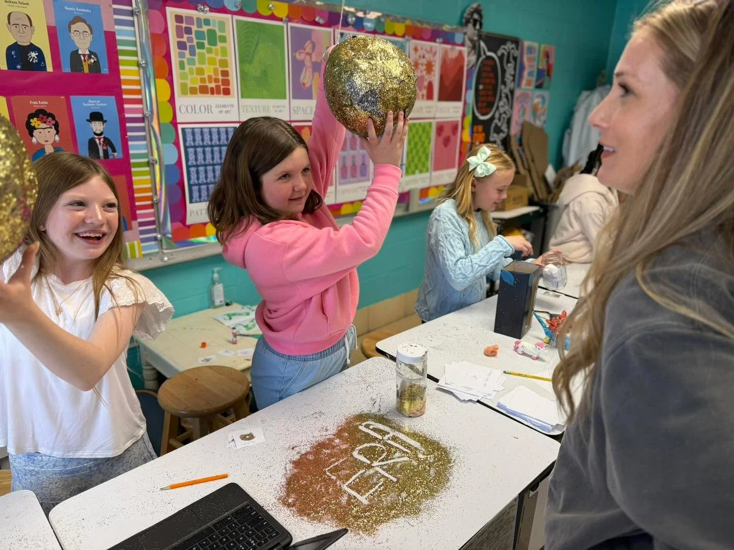 Our fourth grade artists transformed the LS art room and science lab into a fully interactive gallery, where every piece invited visitors to step in, contribute, and create.

From adding drawings to a box sculpture and building with Legos to writing 